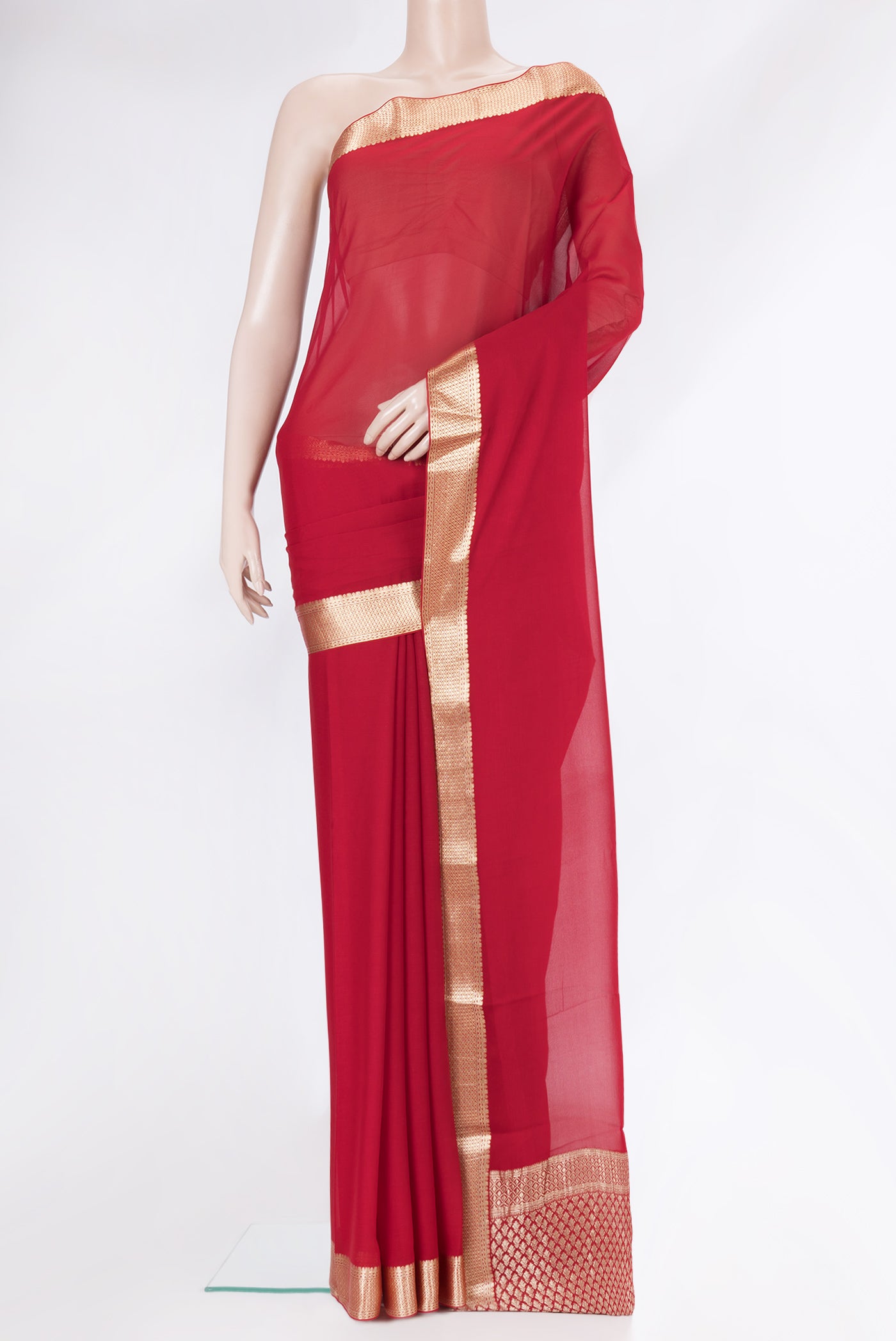 Red Mysore Chiffon Saree with Zari Butta on the body and Zari Border.  displayed on a mannequin