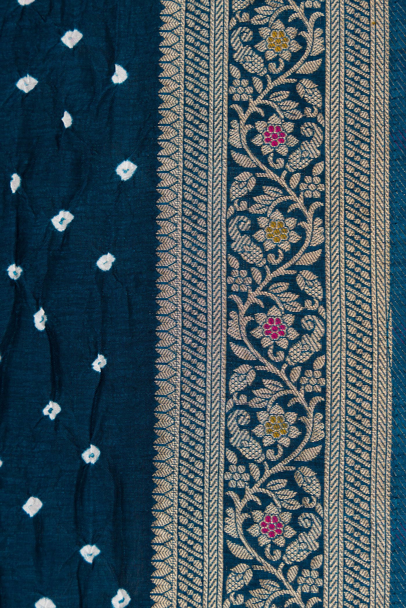 Border image of Peacock Blue Dual Tone Bandhani Silk Saree with Bandhani Print on the body and Zari Border. 