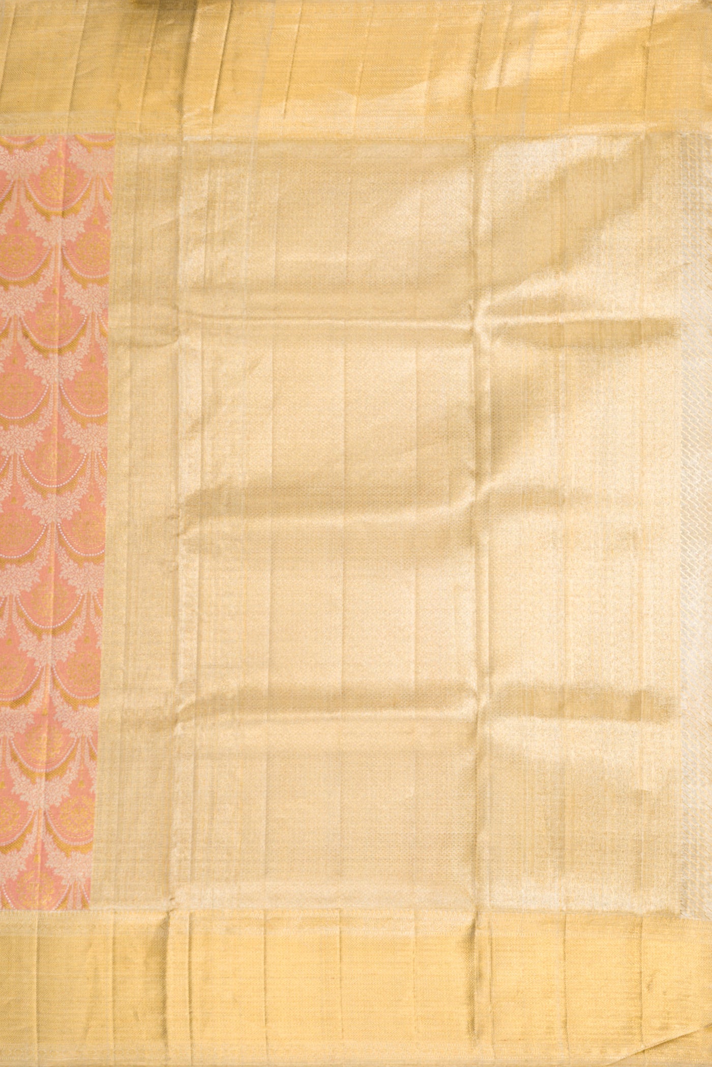 Close up image of the pallu of Rose Gold Dual Tone Kanjivaram Tissue Silk Saree with Zari Brocade on the body and Zari Border. 