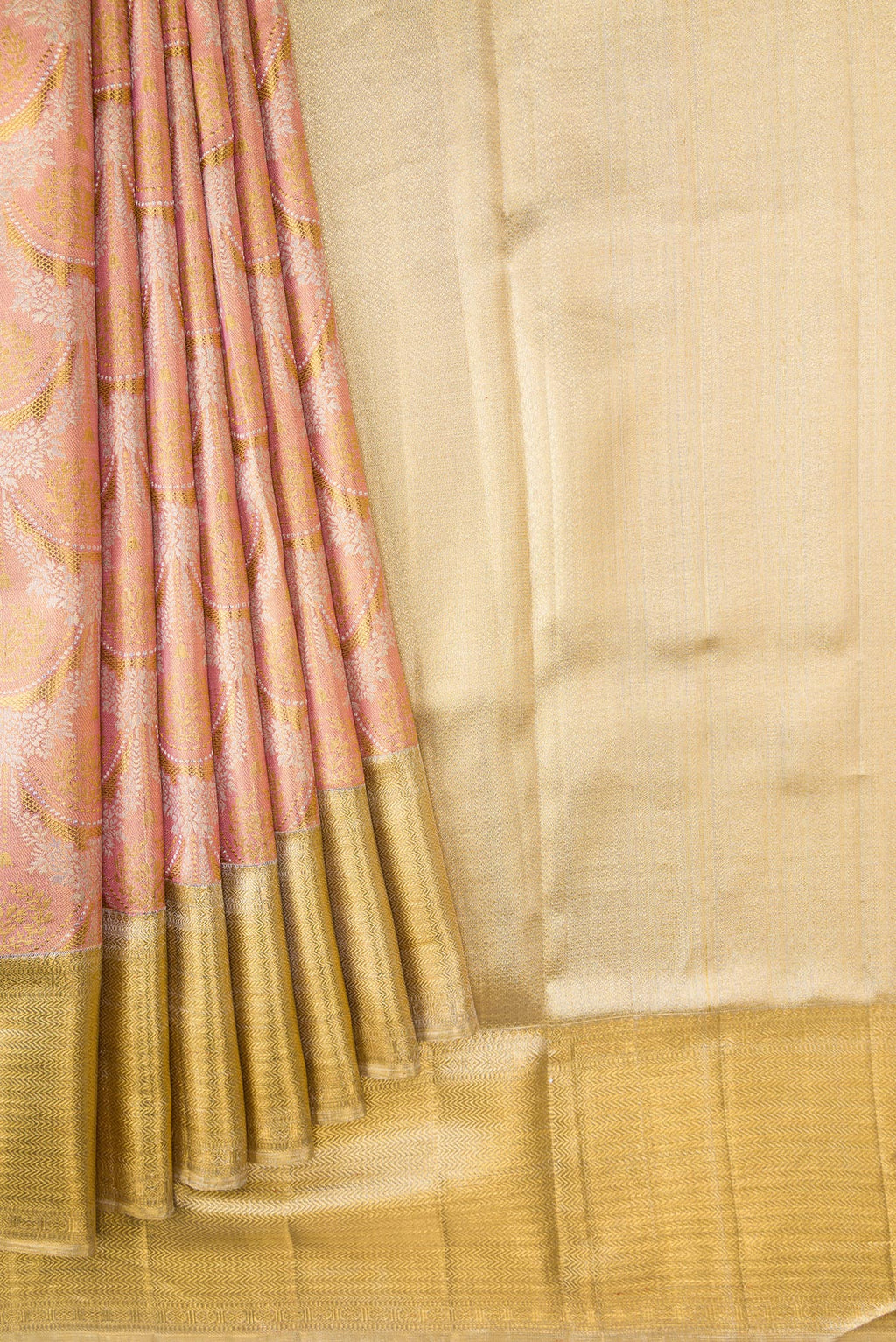 Pleats and pallu of Rose Gold Dual Tone Kanjivaram Tissue Silk Saree with Zari Brocade on the body and Zari Border. 