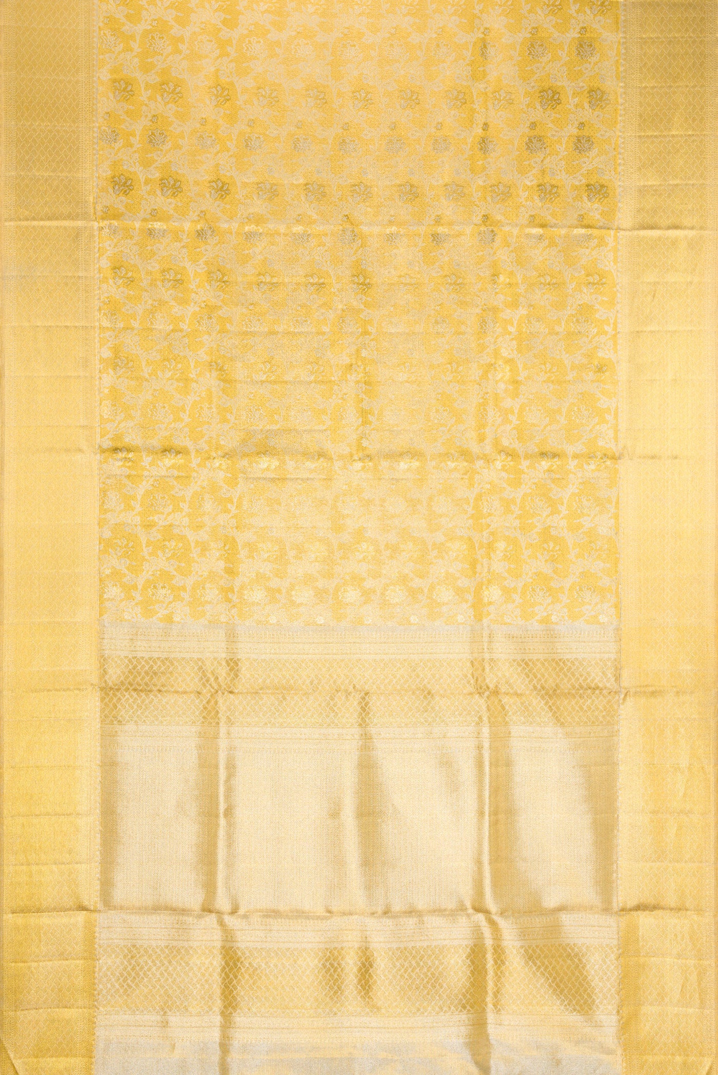 Flat view of Gold Dual Tone Kanjivaram Tissue Silk Saree with Zari Brocade on the body and Zari Border. 