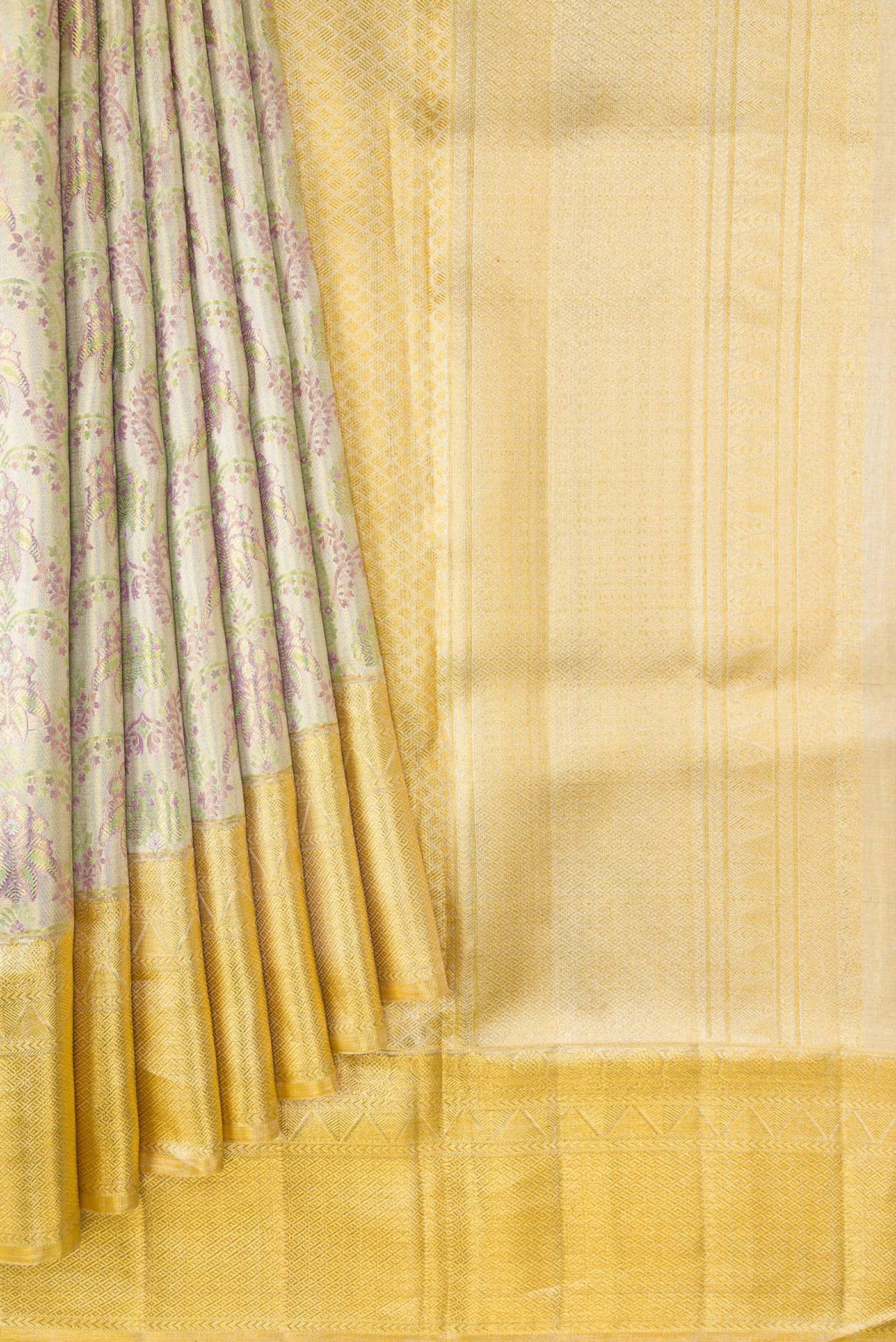 Pleats and pallu of Gold Dual Tone Kanjivaram Tissue Silk Saree with Zari Brocade on the body and Zari Border. 
