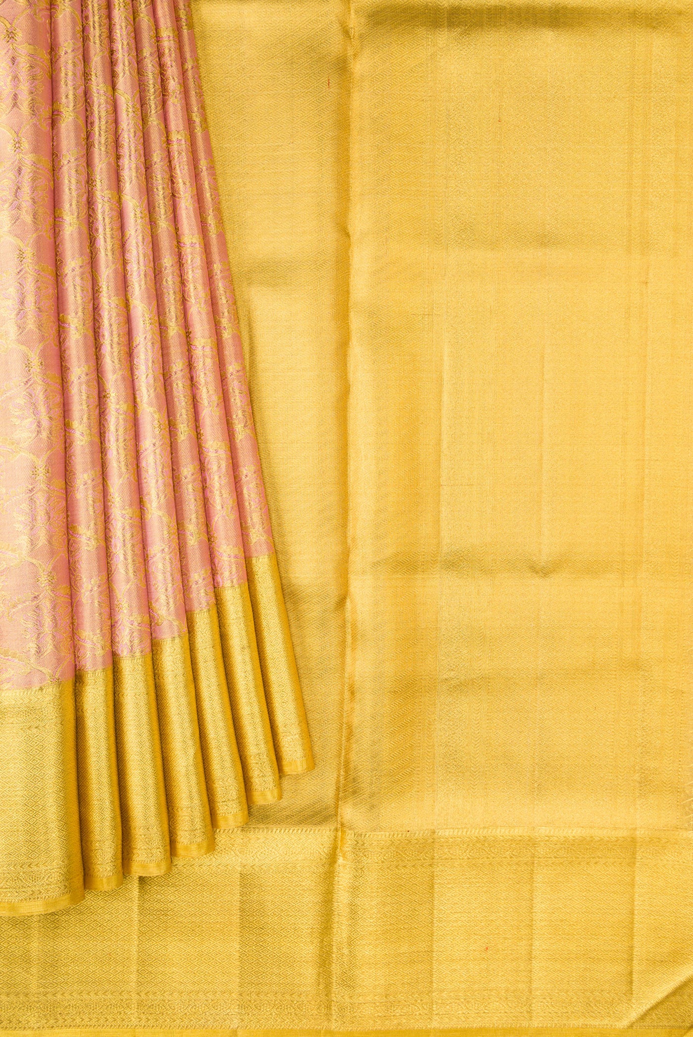 Pleats and pallu of Rose Gold Dual Tone Kanjivaram Tissue Silk Saree with Zari Brocade on the body and Zari Border. 
