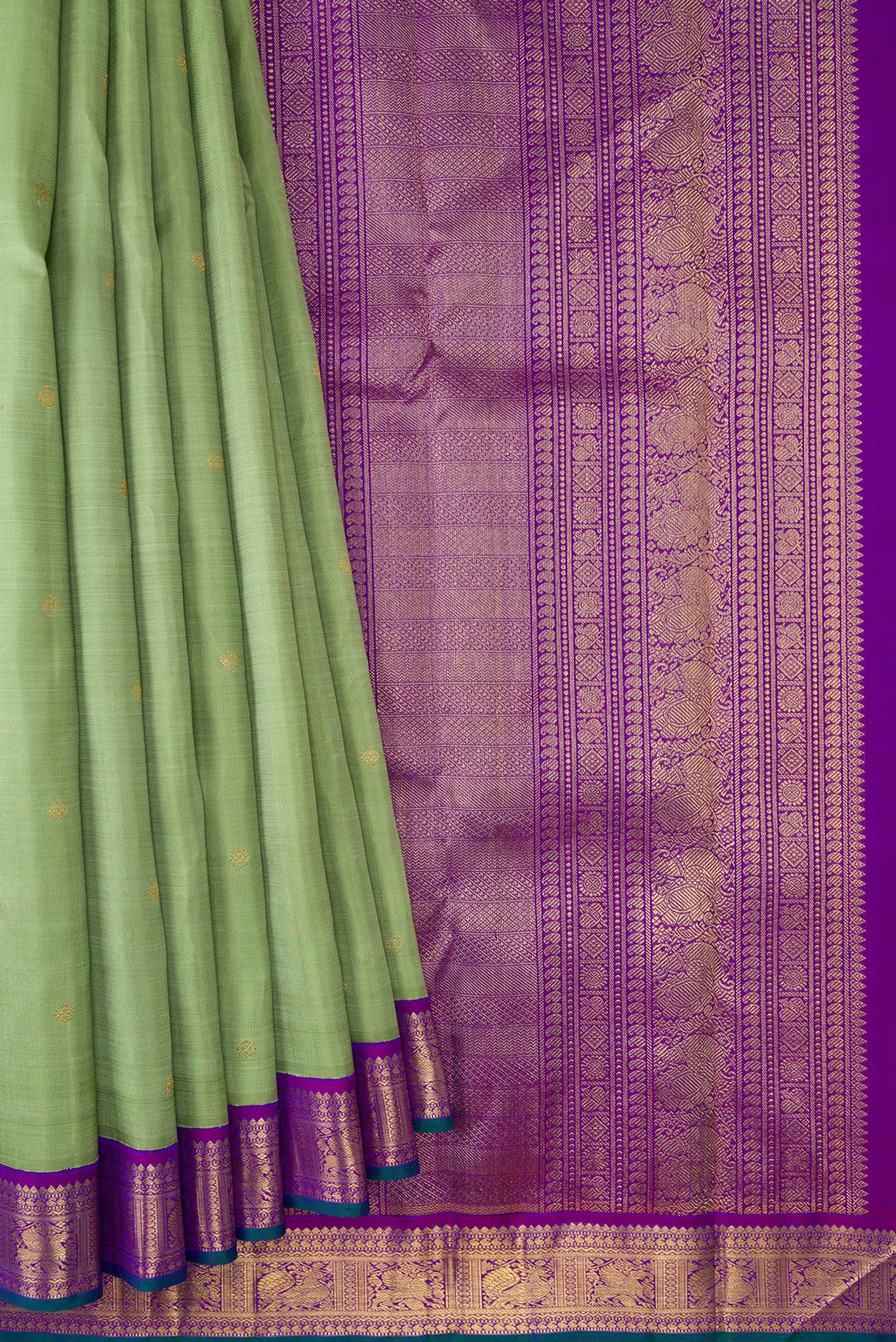 Pleats and pallu of Pure Silk Pure Zari Pista Green Dual Tone Kanjivaram Saree with Zari Butta on the body and Zari Border. 