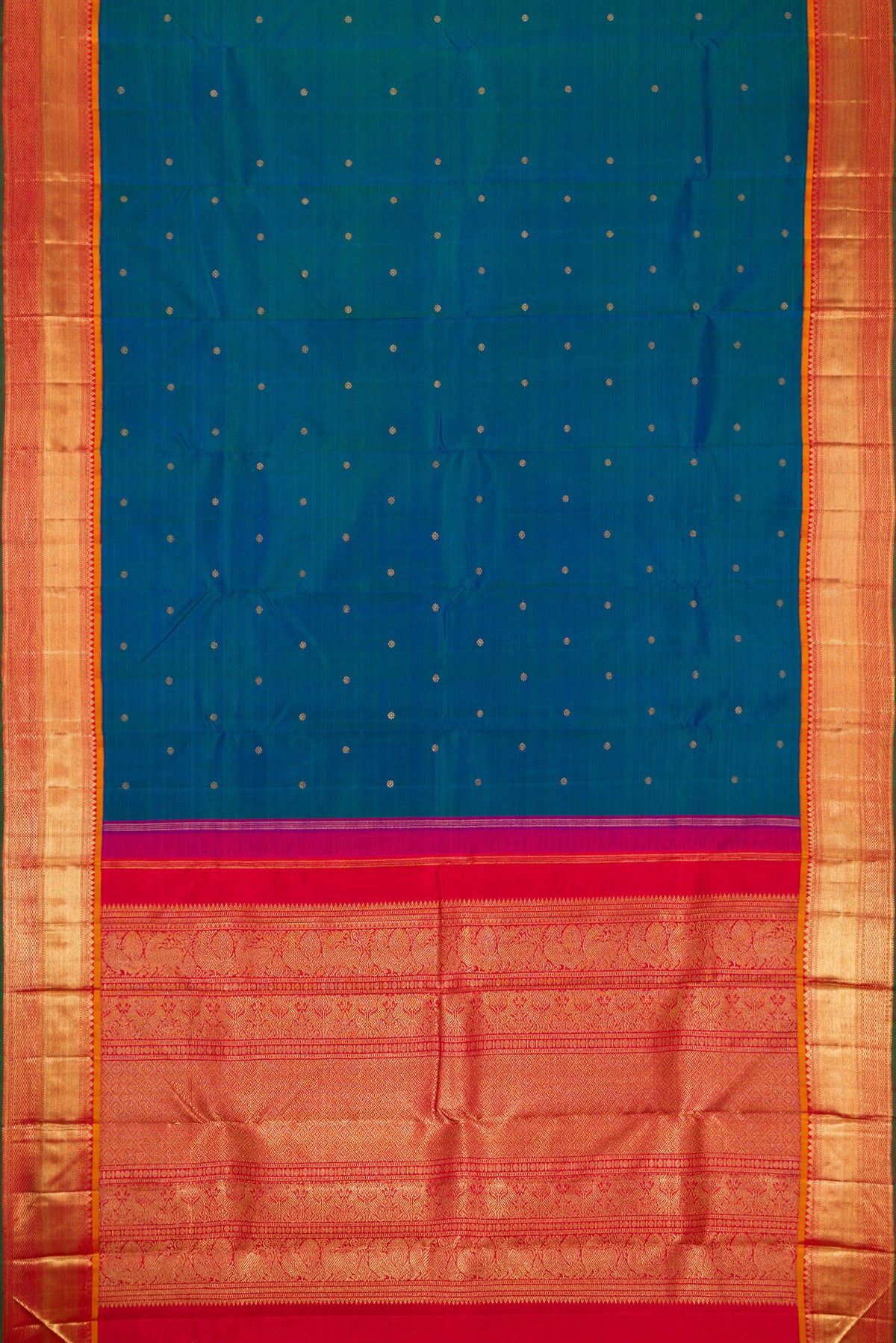 Flat view of Pure Silk Pure Zari Peacock Blue Dual Tone Kanjivaram Saree with Zari Butta on the body and Zari Border. 