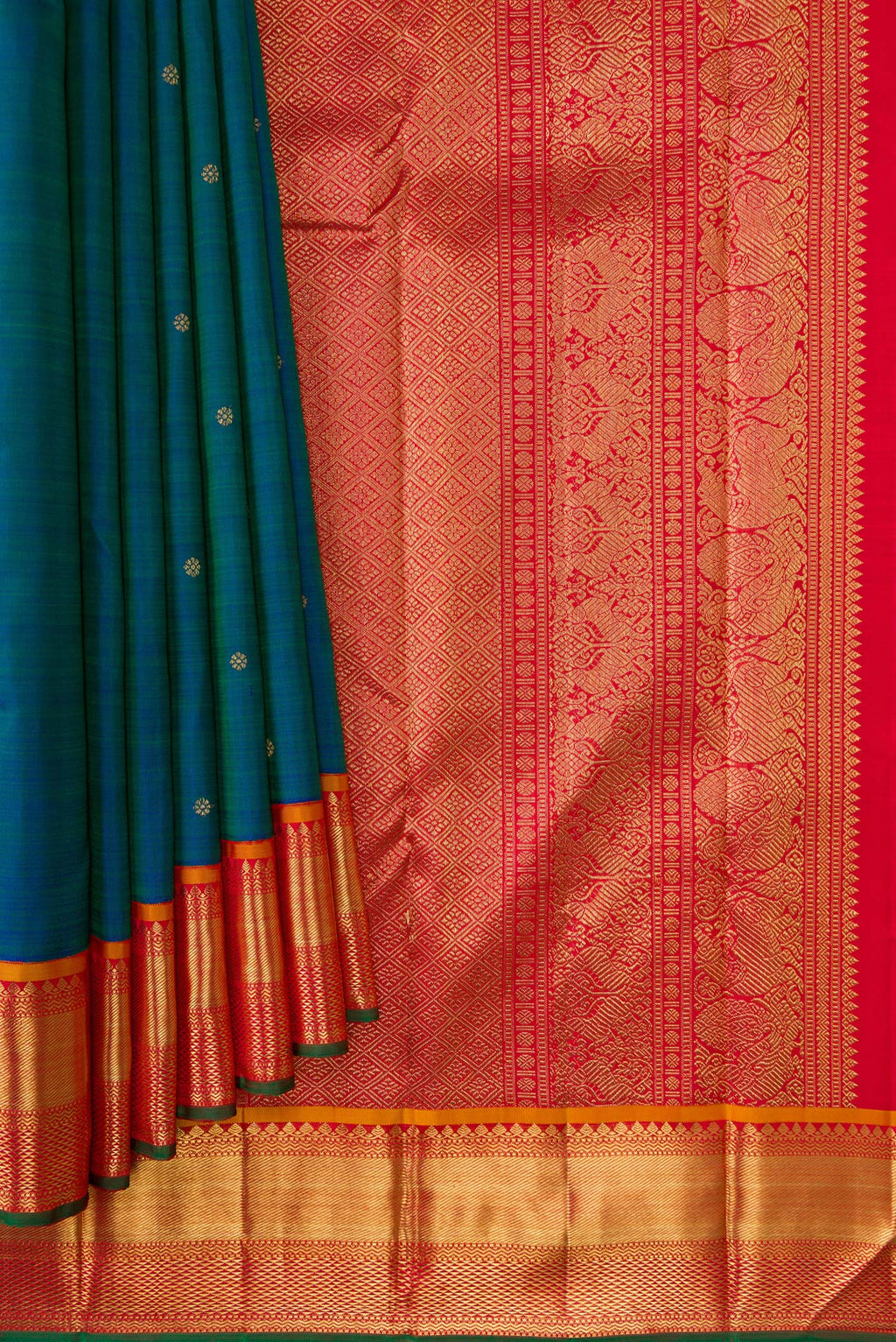 Pleats and pallu of Pure Silk Pure Zari Peacock Blue Dual Tone Kanjivaram Saree with Zari Butta on the body and Zari Border. 