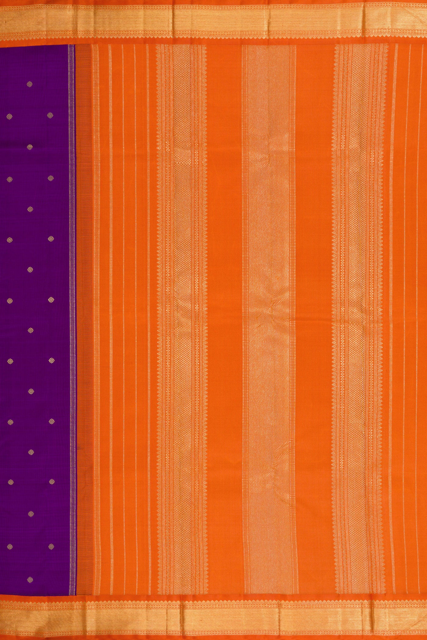 Close up image of the pallu of Violet Dual Tone Kanjivaram Silk Saree with Zari Butta on the body and Zari Border. 