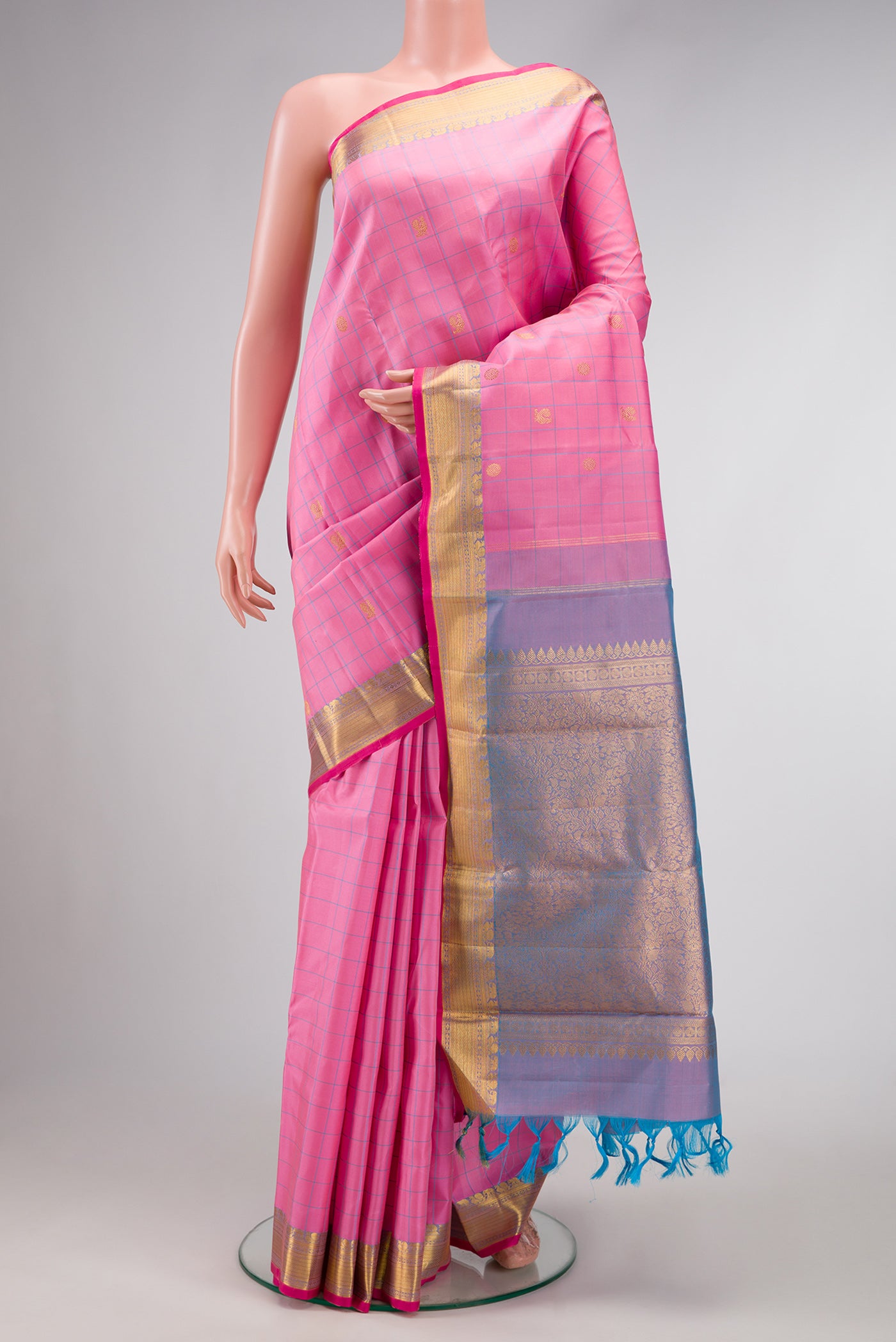 Pure Silk Pure Zari Pink Dual Tone Kanjivaram Saree with Checked design on the body and Zari Border.  displayed on a mannequin
