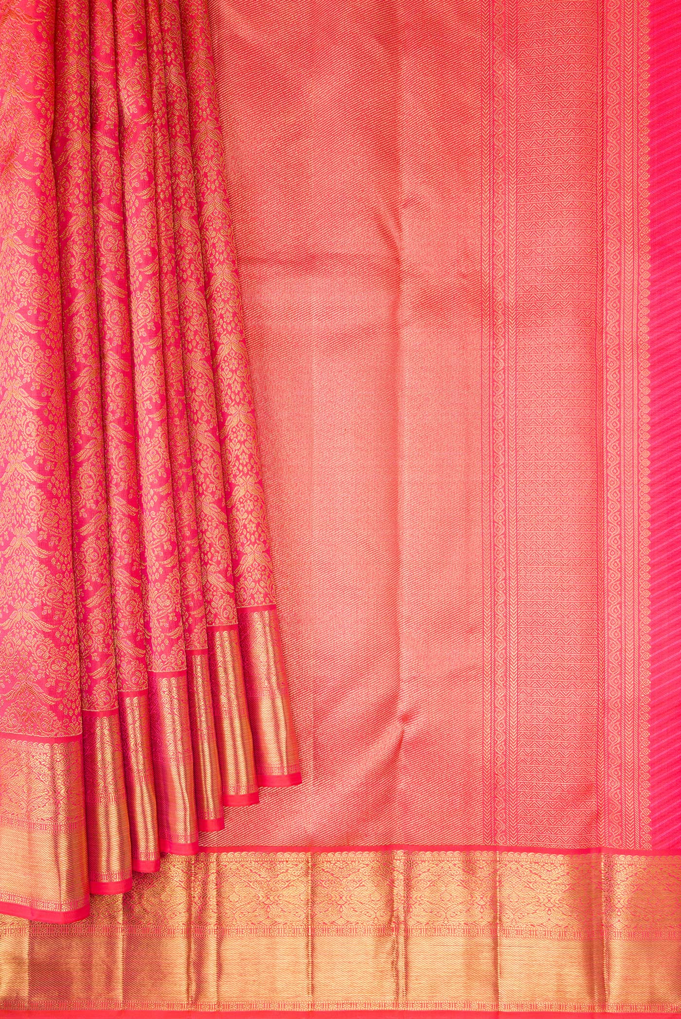 Pleats and pallu of Pure Silk Pure Zari Coral Dual Tone Kanjivaram Saree with Zari Brocade on the body and Zari Border. 