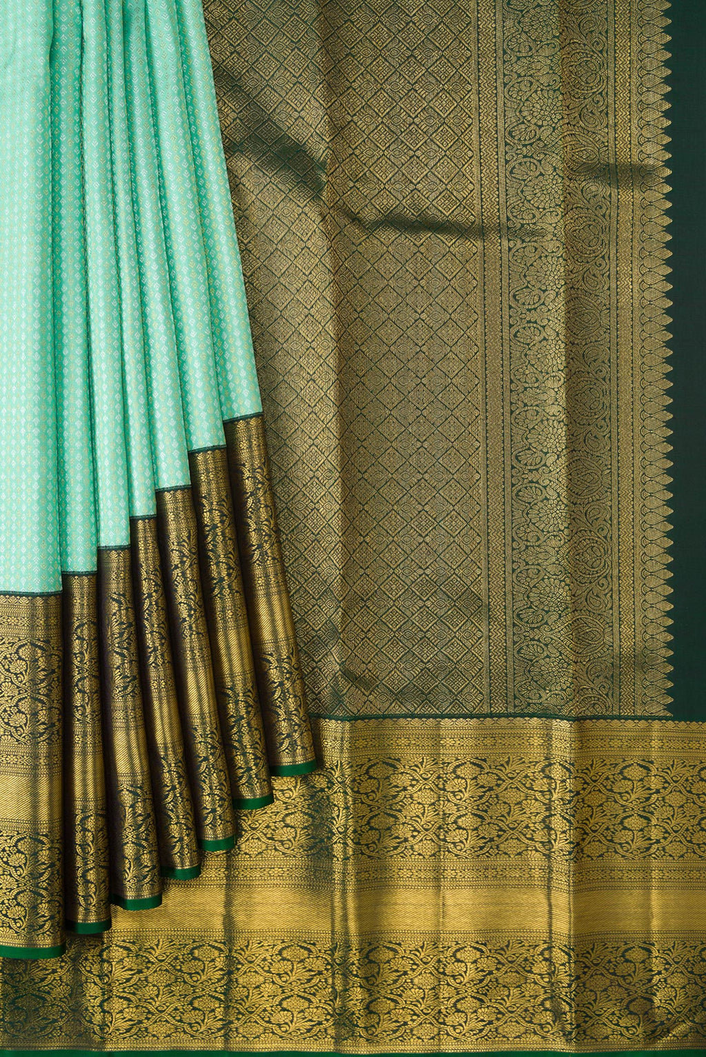 Pleats and pallu of Light Green Dual Tone Kanjivaram Silk Saree with Zari Brocade on the body and Zari Border. 