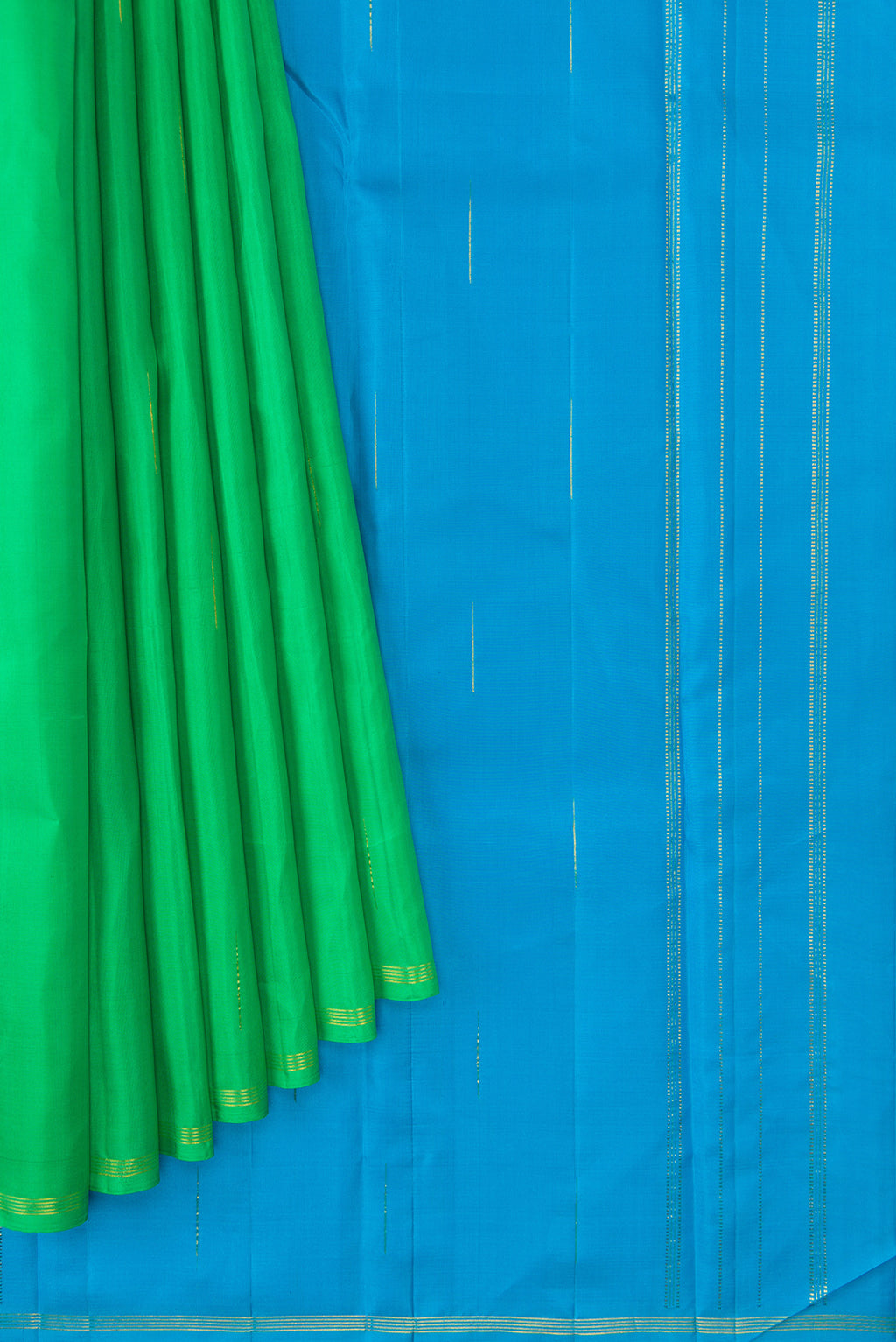 Pleats and pallu of Parrot Green Dual Tone Kanjivaram Silk Saree with Zari Butta on the body and Zari Border. 