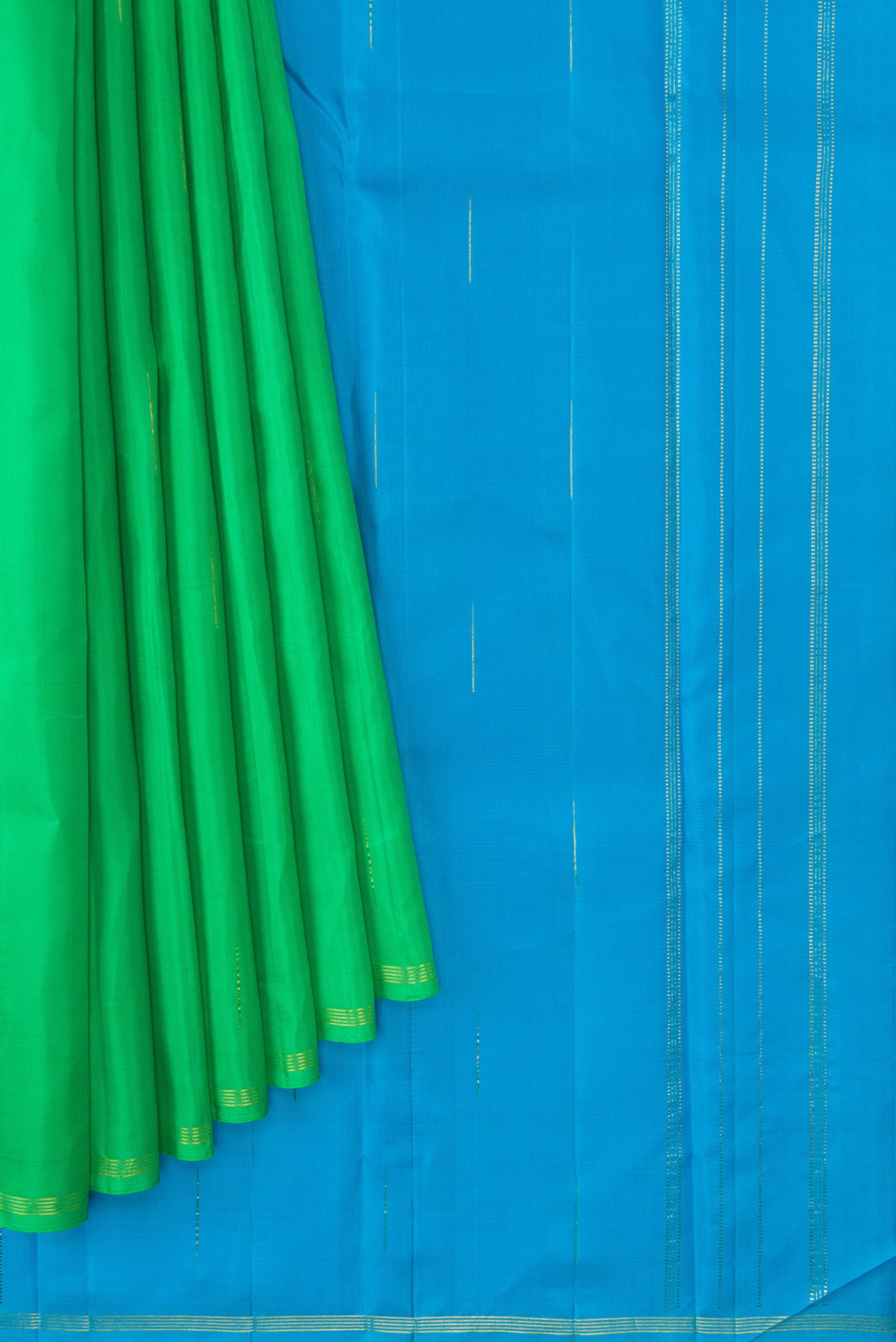 Pleats and pallu of Parrot Green Dual Tone Kanjivaram Silk Saree with Zari Butta on the body and Zari Border. 