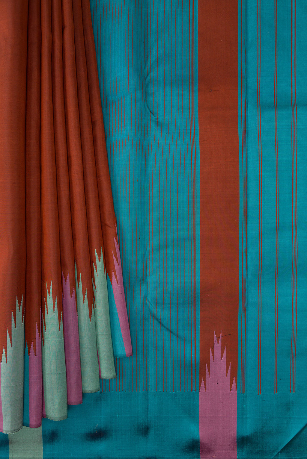 Pleats and pallu of Brown Dual Tone Kanchipuram Silk Saree with Plain Body and Temple Border. 