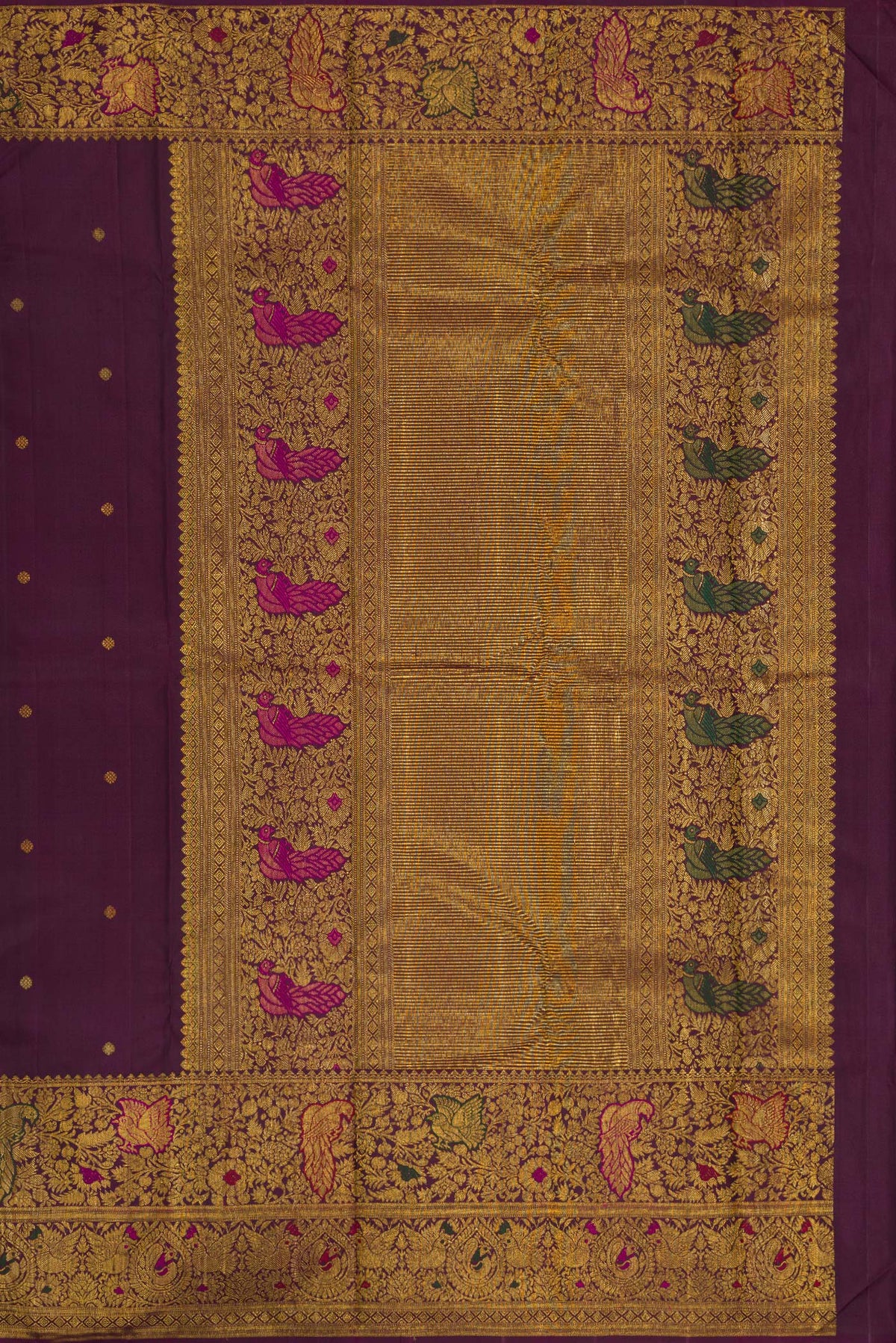 Close up image of the pallu of Burgundy Dual Tone Kanchipuram Silk Saree with Zari Butta on the body and Fancy Border. 