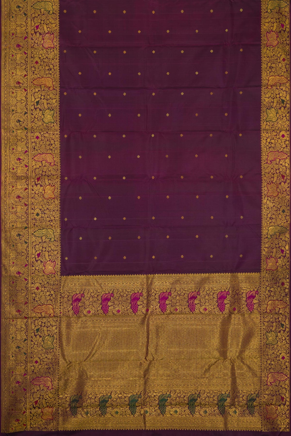 Flat view of Burgundy Dual Tone Kanchipuram Silk Saree with Zari Butta on the body and Fancy Border. 