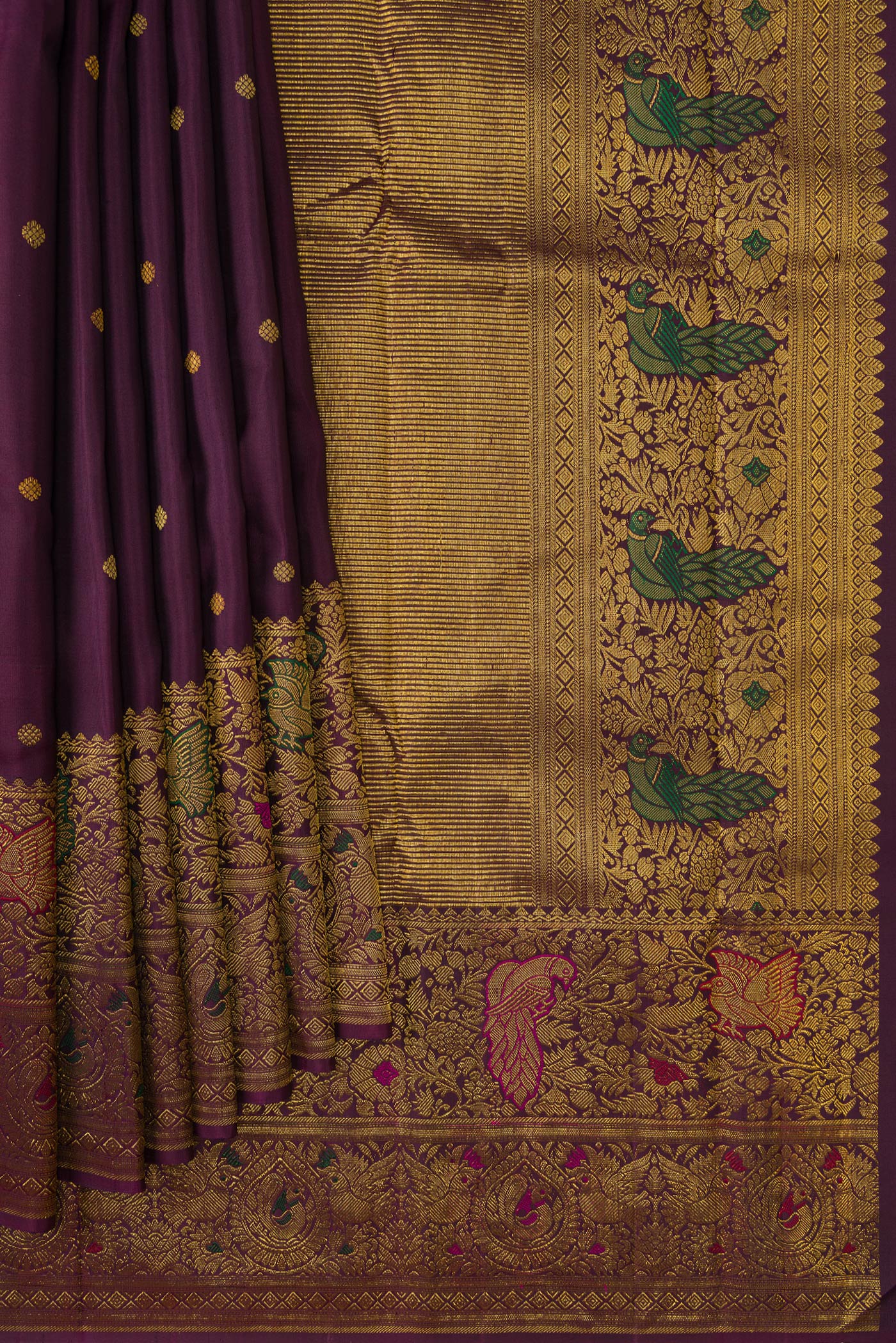 Pleats and pallu of Burgundy Dual Tone Kanchipuram Silk Saree with Zari Butta on the body and Fancy Border. 