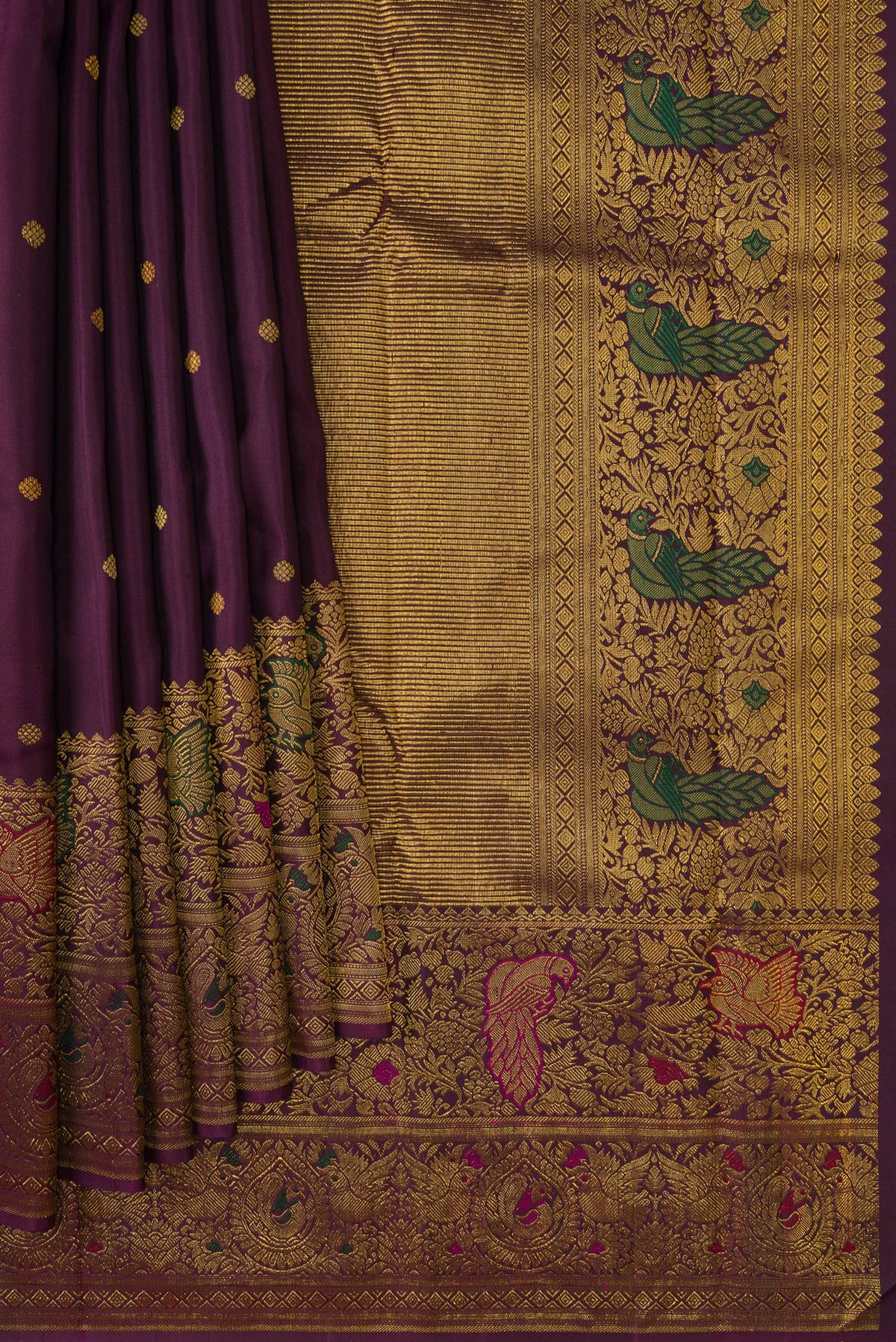 Pleats and pallu of Burgundy Dual Tone Kanchipuram Silk Saree with Zari Butta on the body and Fancy Border. 