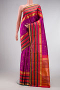 Pure Silk Pure Zari Purple Dual Tone Kanjivaram Saree with Checked design on the body and Zari Border.  displayed on a mannequin