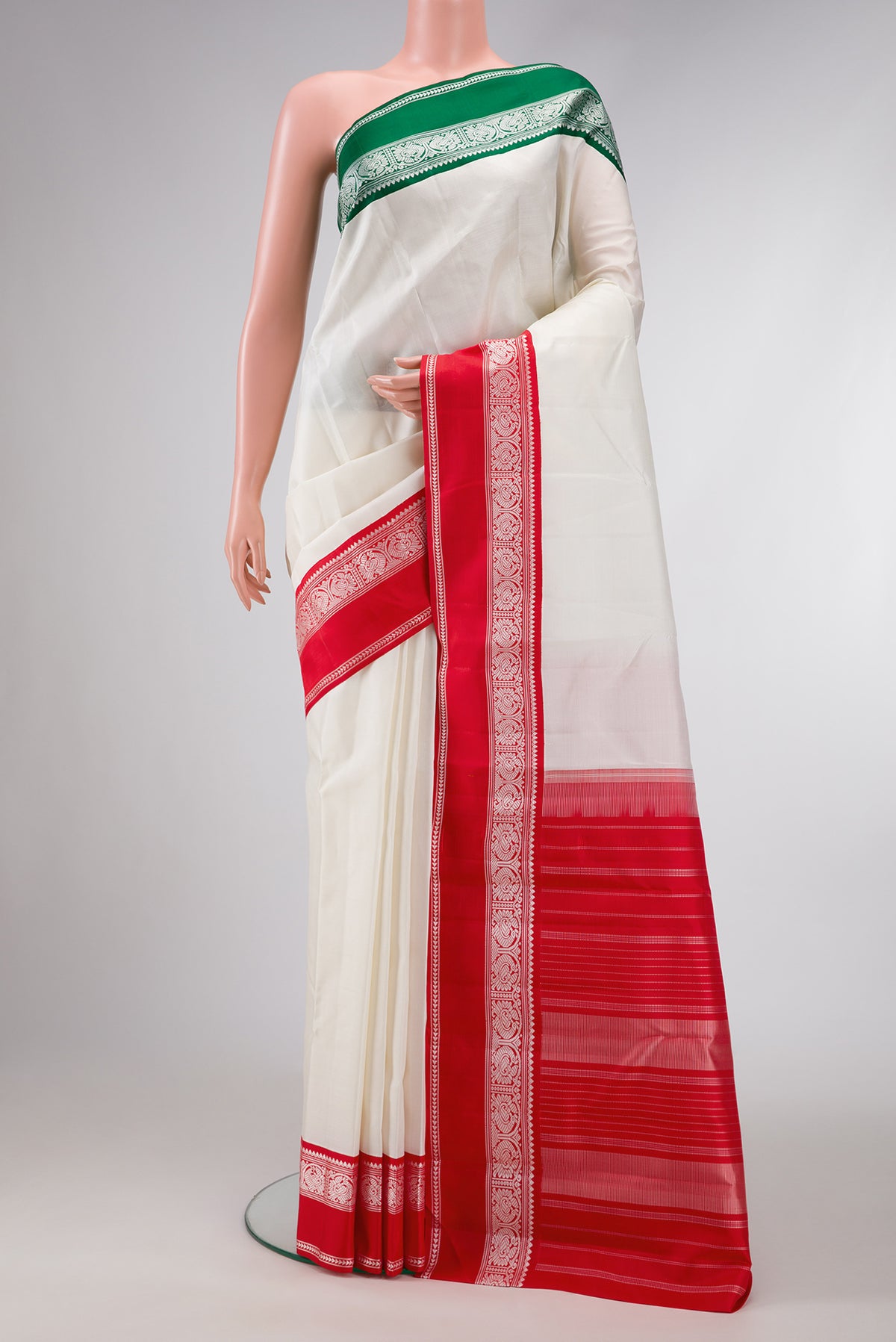 White Dual Tone Kanjivaram Silk Saree with Plain Body and Ganga Jamuna Border.  displayed on a mannequin