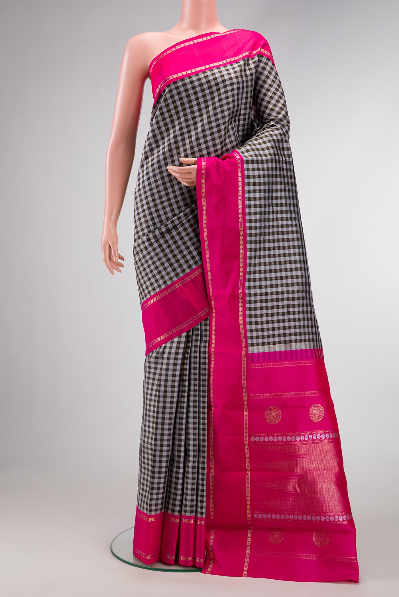 Pure Silk Pure Zari Grey Dual Tone Kanjivaram Saree with Checked design on the body and Zari Border.  displayed on a mannequin