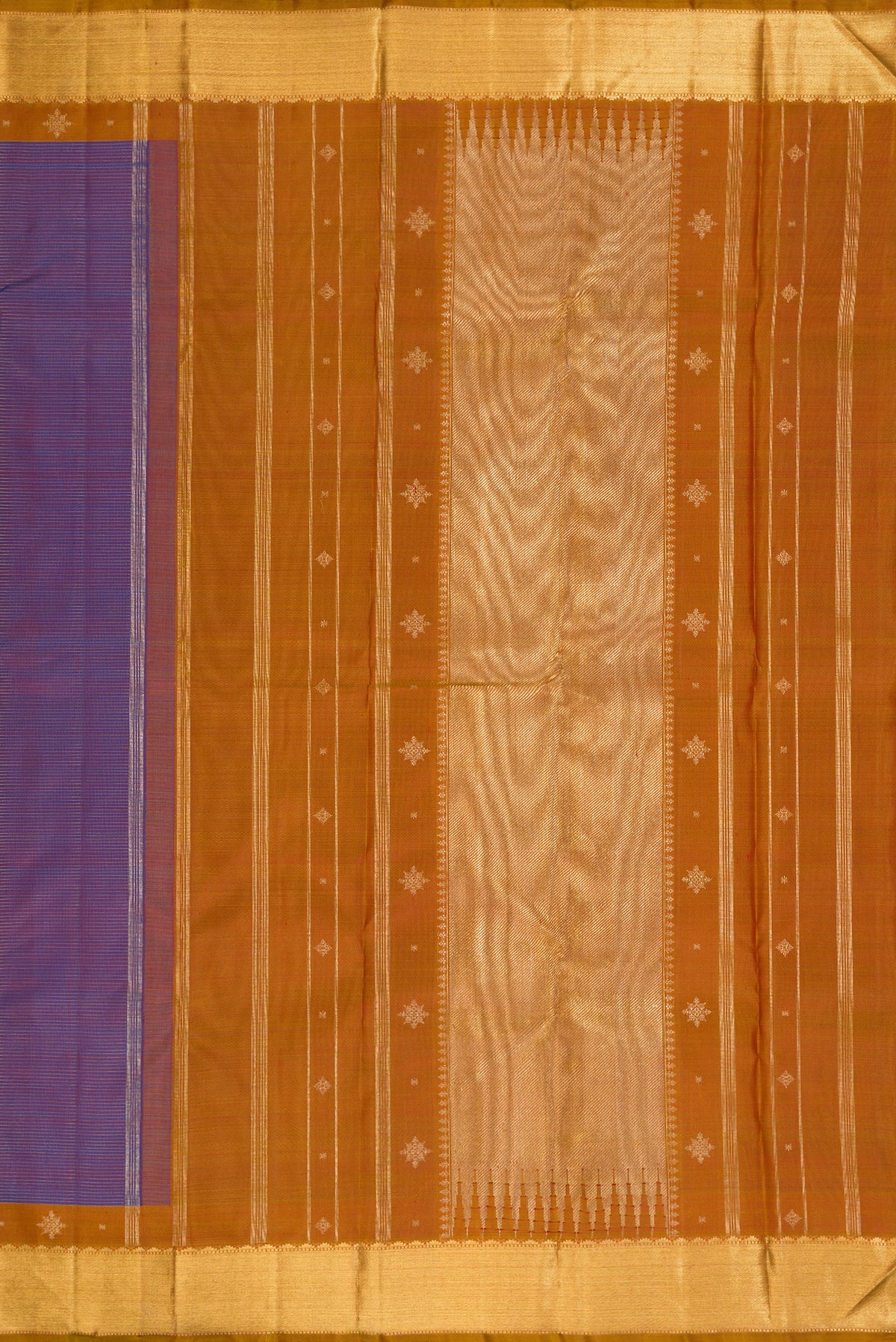 Close up image of the pallu of Pure Silk Pure Zari Purple Dual Tone Kanjivaram Saree with Stripes on the body and Zari Border. 