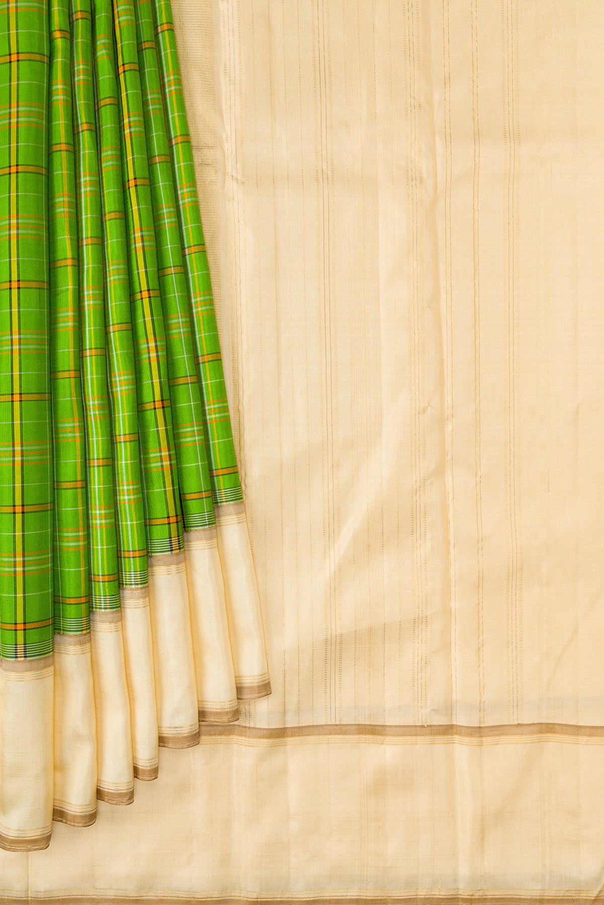 Pleats and pallu of Pure Silk Pure Zari Parrot Green Dual Tone Kanjivaram Saree with Checked design on the body and Zari Border. 