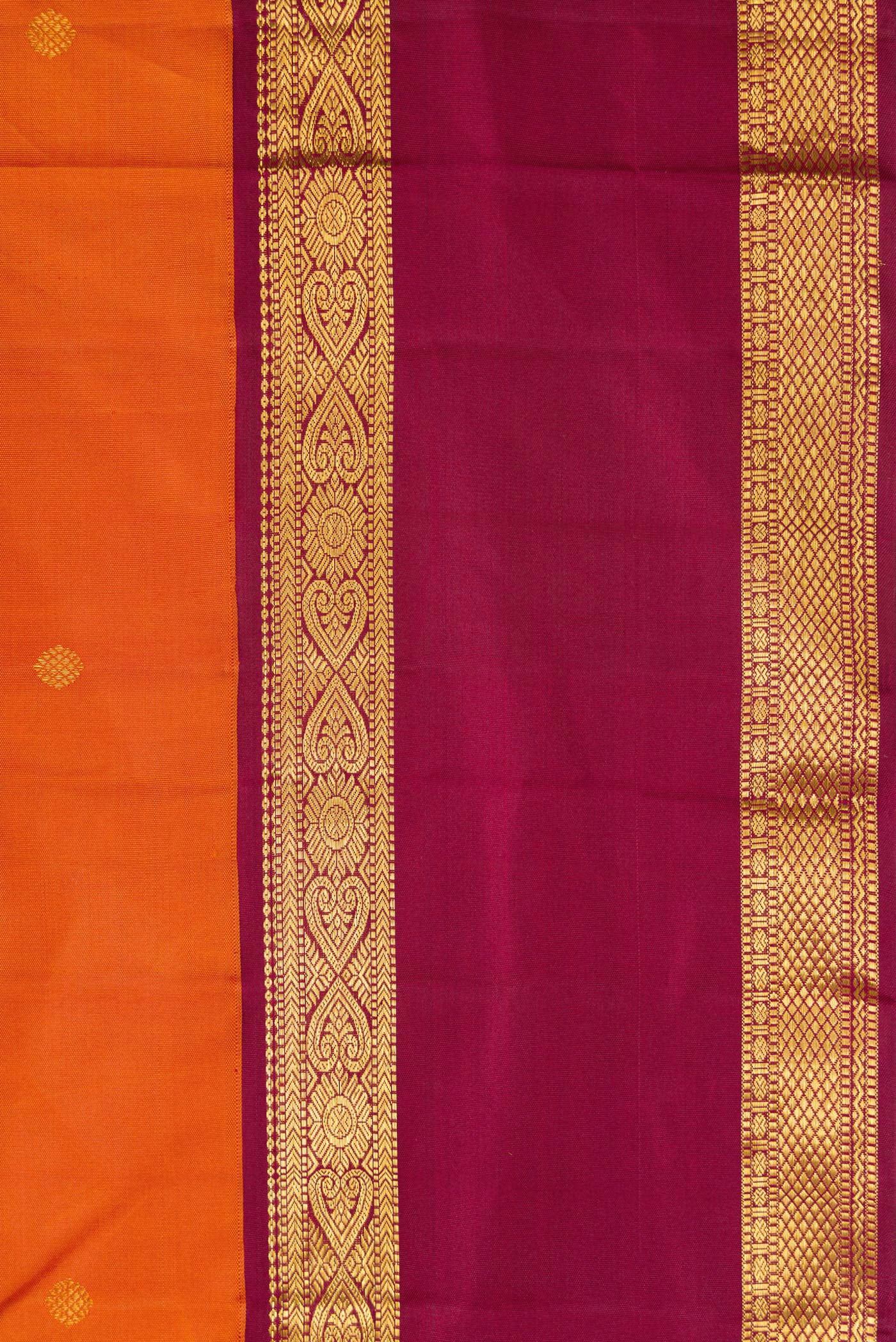 Border image of Pure Silk Pure Zari Brick Orange Dual Tone Kanjivaram Saree with Zari Butta on the body and Zari Border. 