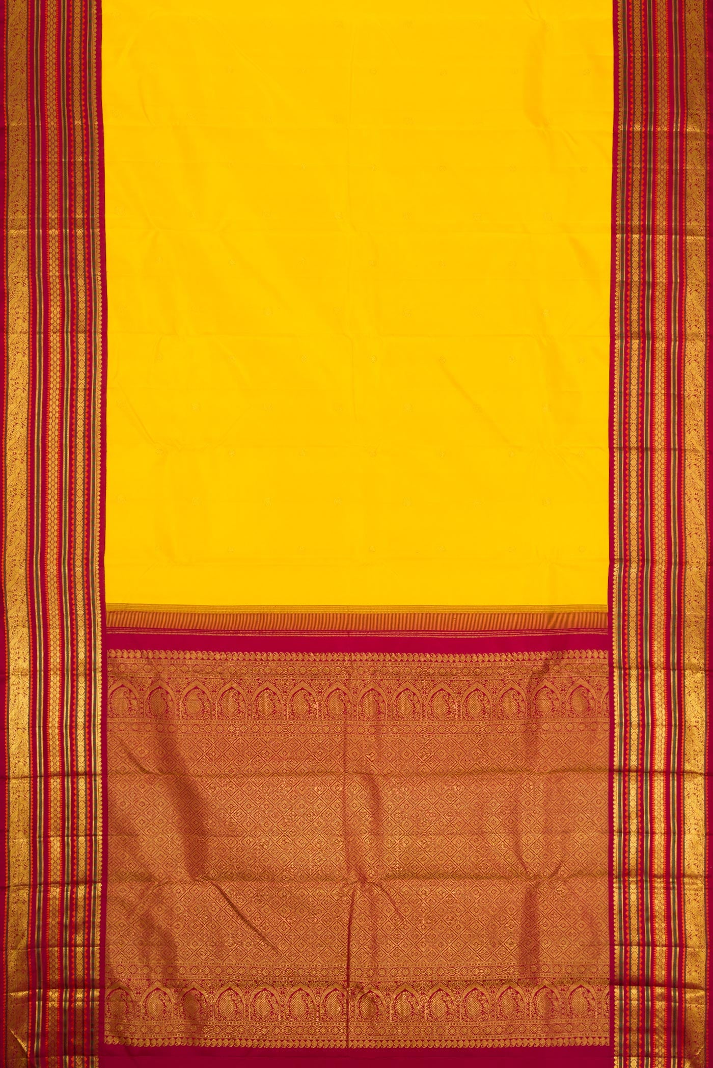 Flat view of Pure Silk Pure Zari Yellow Dual Tone Kanjivaram Saree with Zari Butta on the body and Zari Border. 