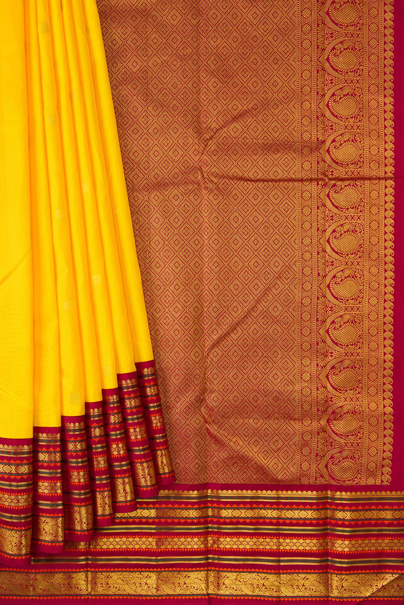 Pleats and pallu of Pure Silk Pure Zari Yellow Dual Tone Kanjivaram Saree with Zari Butta on the body and Zari Border. 