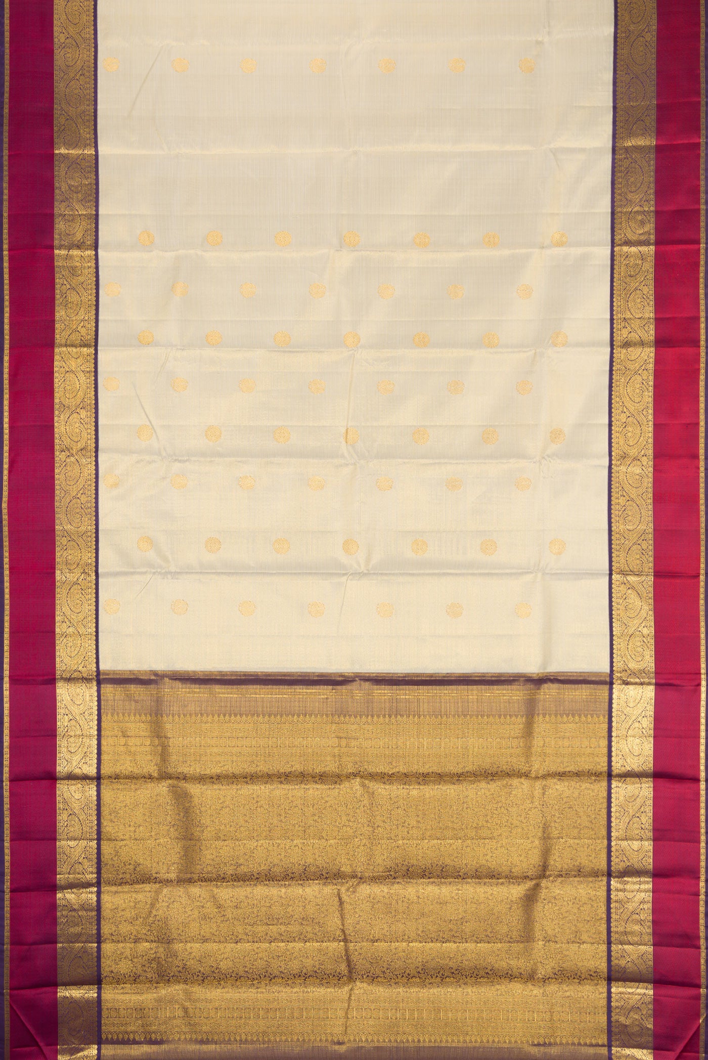 Flat view of Beige Dual Tone Kanjivaram Silk Saree with Zari Butta on the body and Zari And Thread Border. 
