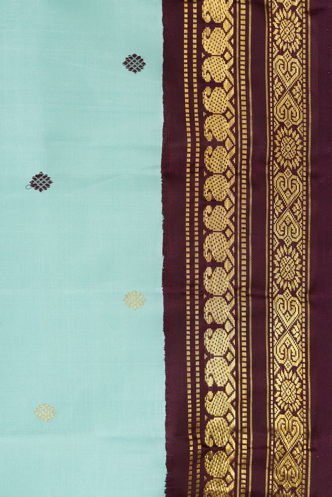 Border image of Sky Blue Dual Tone Kanjivaram Silk Saree with Zari And Thread Butta on the body and Zari Border. 