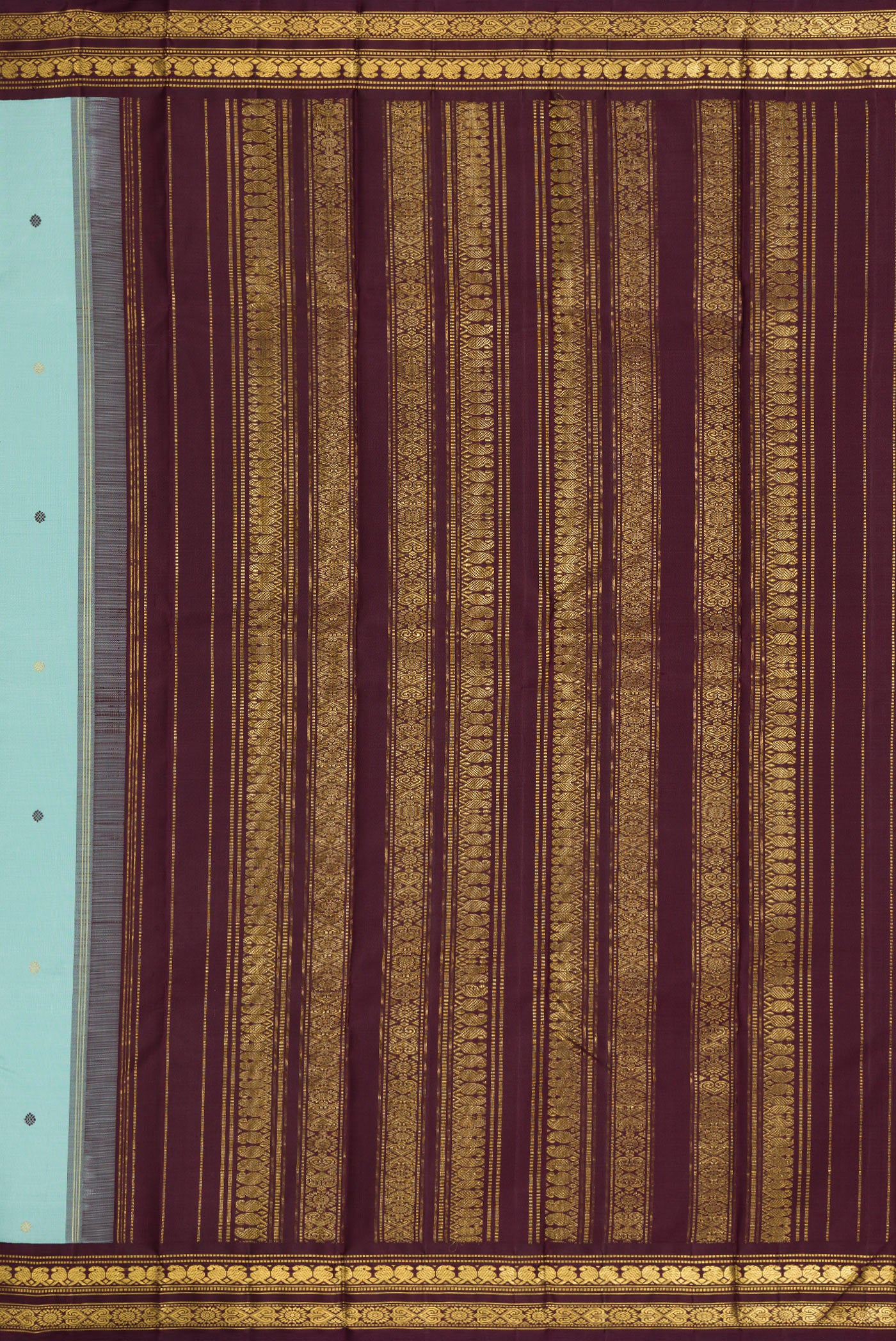 Close up image of the pallu of Sky Blue Dual Tone Kanjivaram Silk Saree with Zari And Thread Butta on the body and Zari Border. 