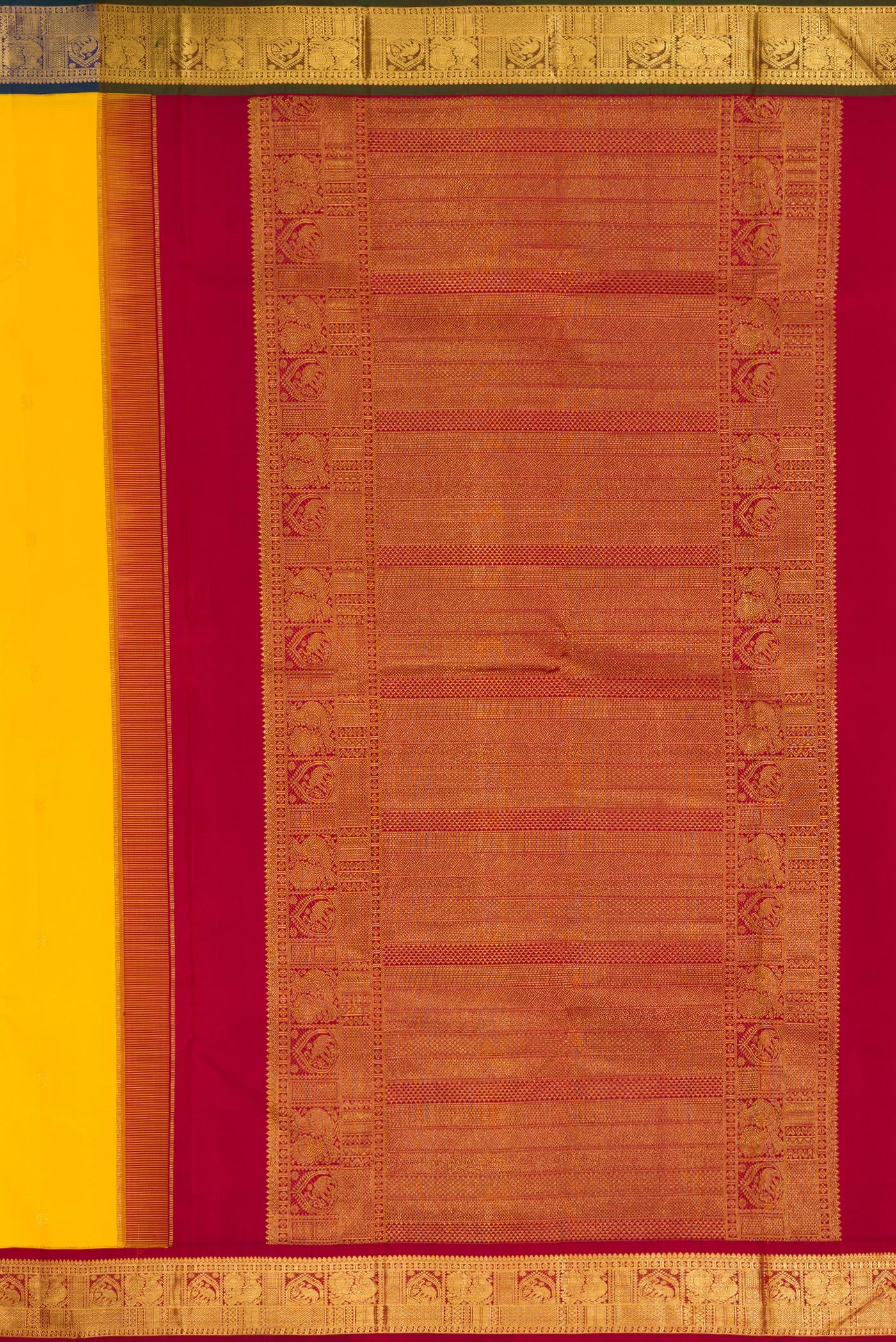 Close up image of the pallu of Yellow Dual Tone Kanjivaram Silk Saree with Zari Butta on the body and Ganga Jamuna Border. 