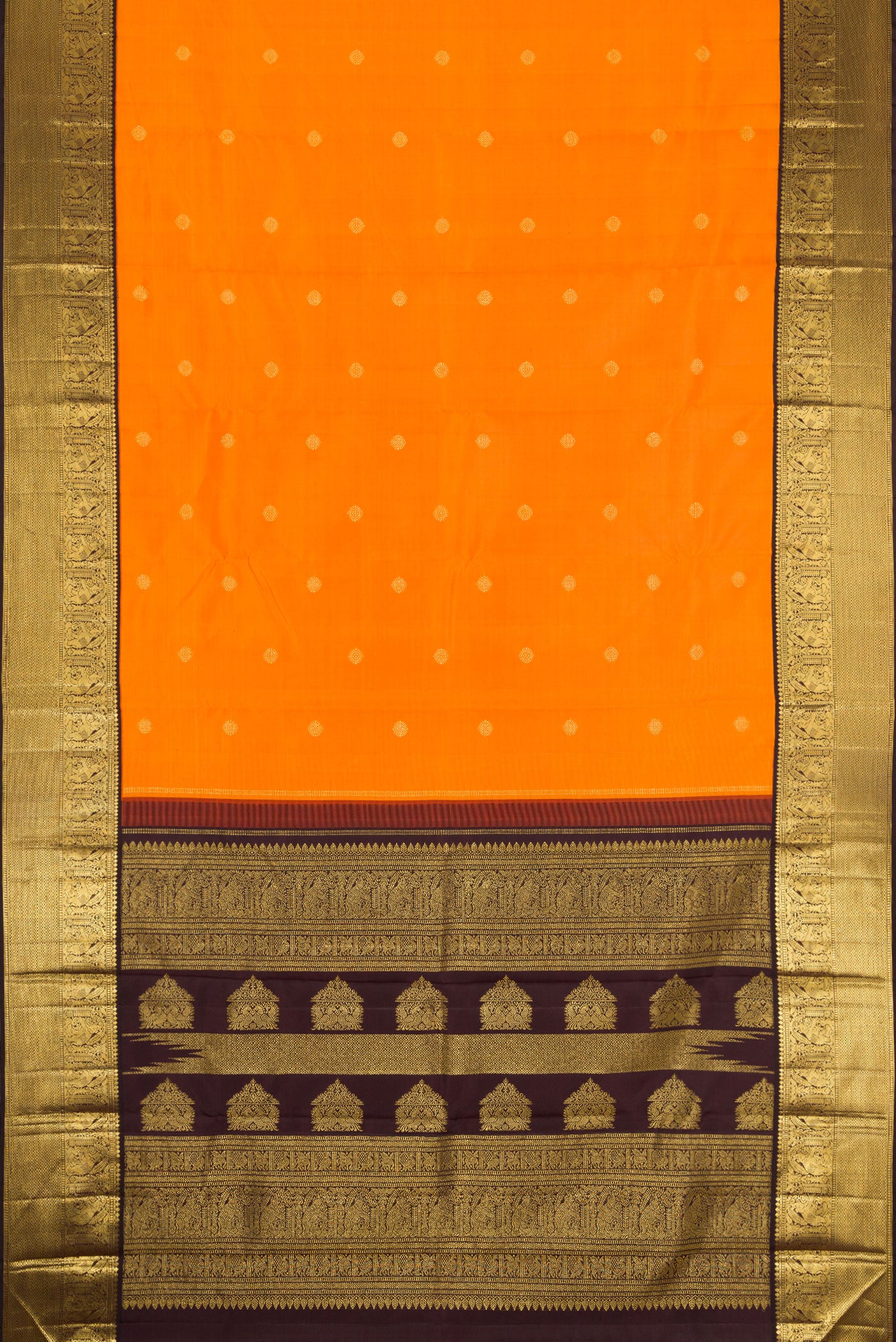 Flat view of Mustard Dual Tone Kanjivaram Silk Saree with Zari Butta on the body and Zari Border. 