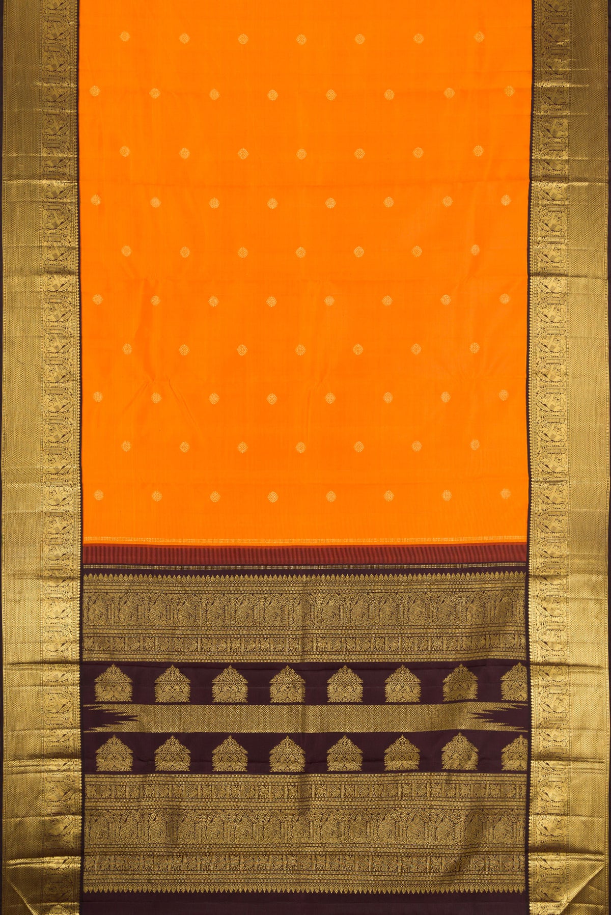 Flat view of Mustard Dual Tone Kanjivaram Silk Saree with Zari Butta on the body and Zari Border. 