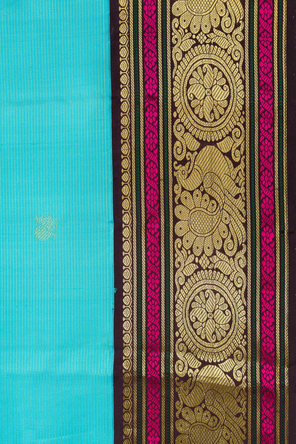 Border image of Sky Blue Dual Tone Kanchipuram Silk Saree with Zari Butta on the body and Zari And Thread Border. 