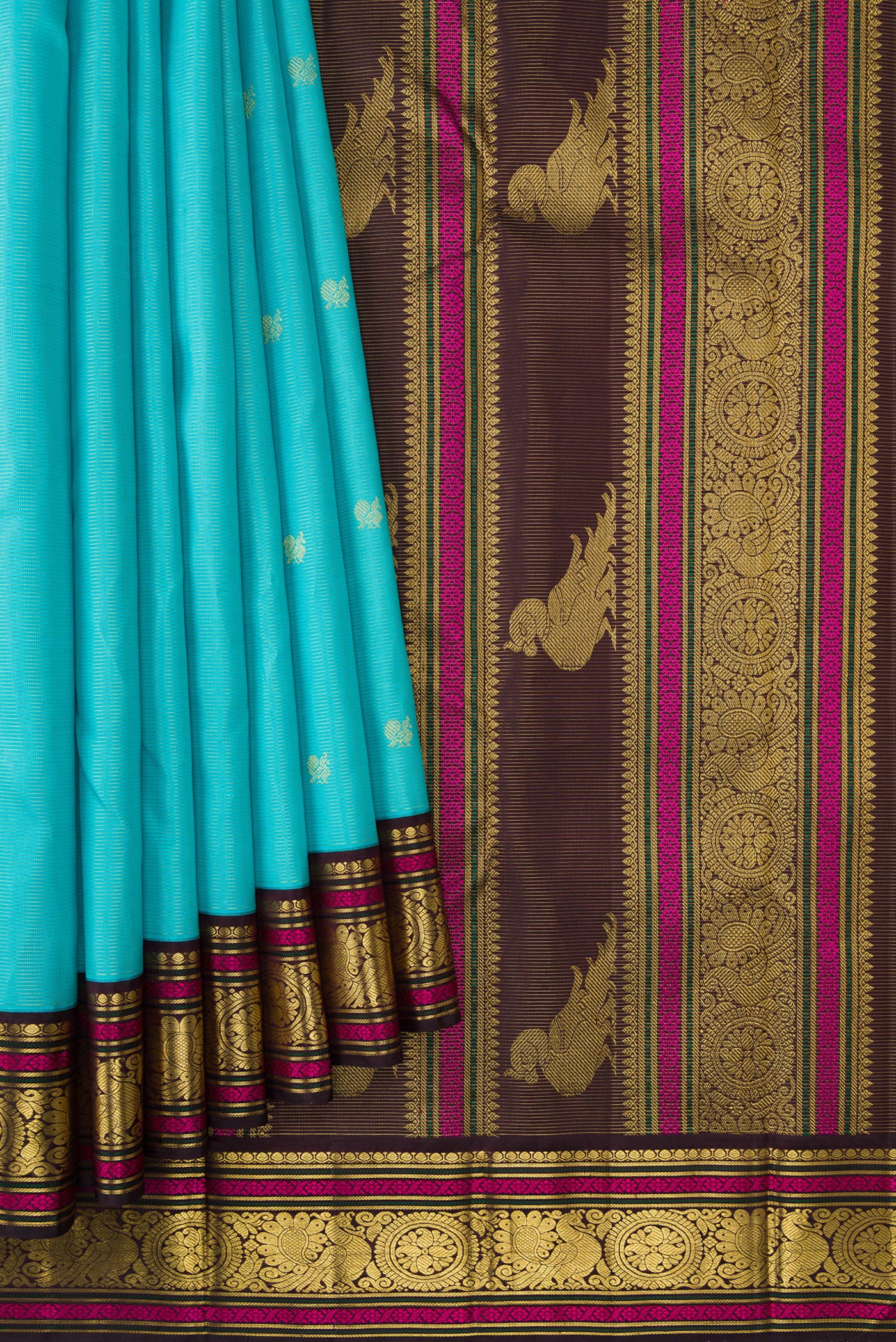 Pleats and pallu of Sky Blue Dual Tone Kanchipuram Silk Saree with Zari Butta on the body and Zari And Thread Border. 