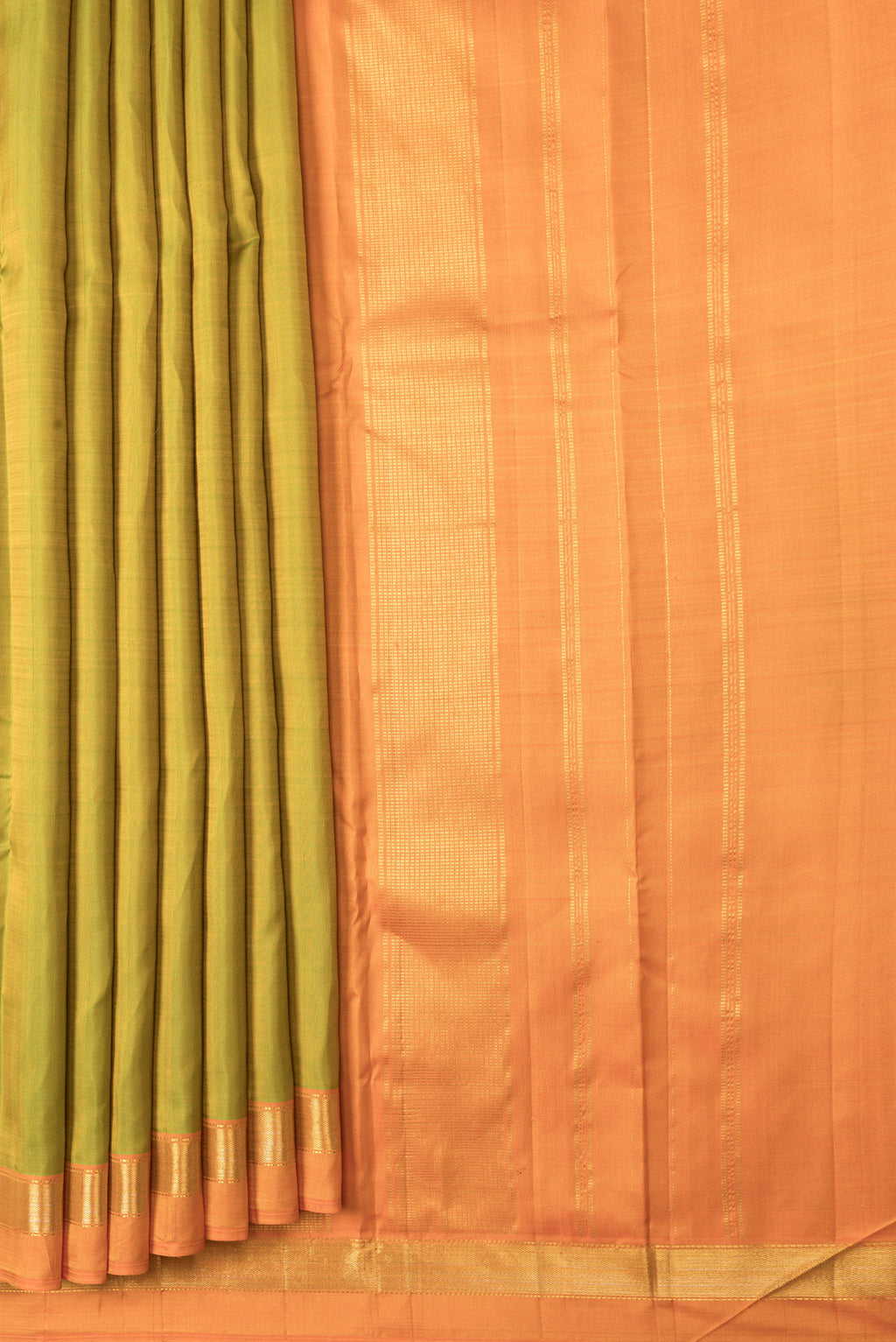 Pleats and pallu of Parrot Green Dual Tone Kanjivaram Silk Saree with Plain Body and Zari Border. 