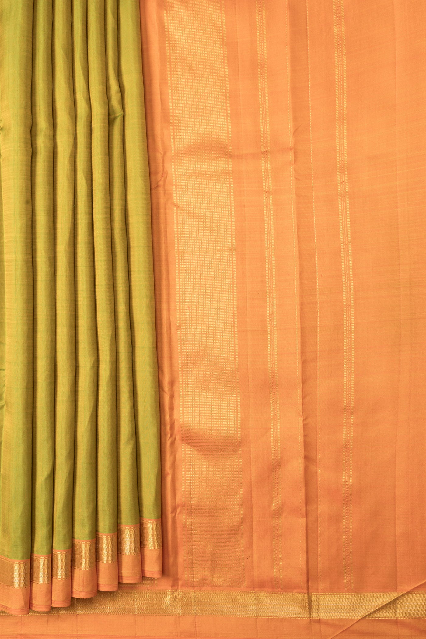 Pleats and pallu of Parrot Green Dual Tone Kanjivaram Silk Saree with Plain Body and Zari Border. 