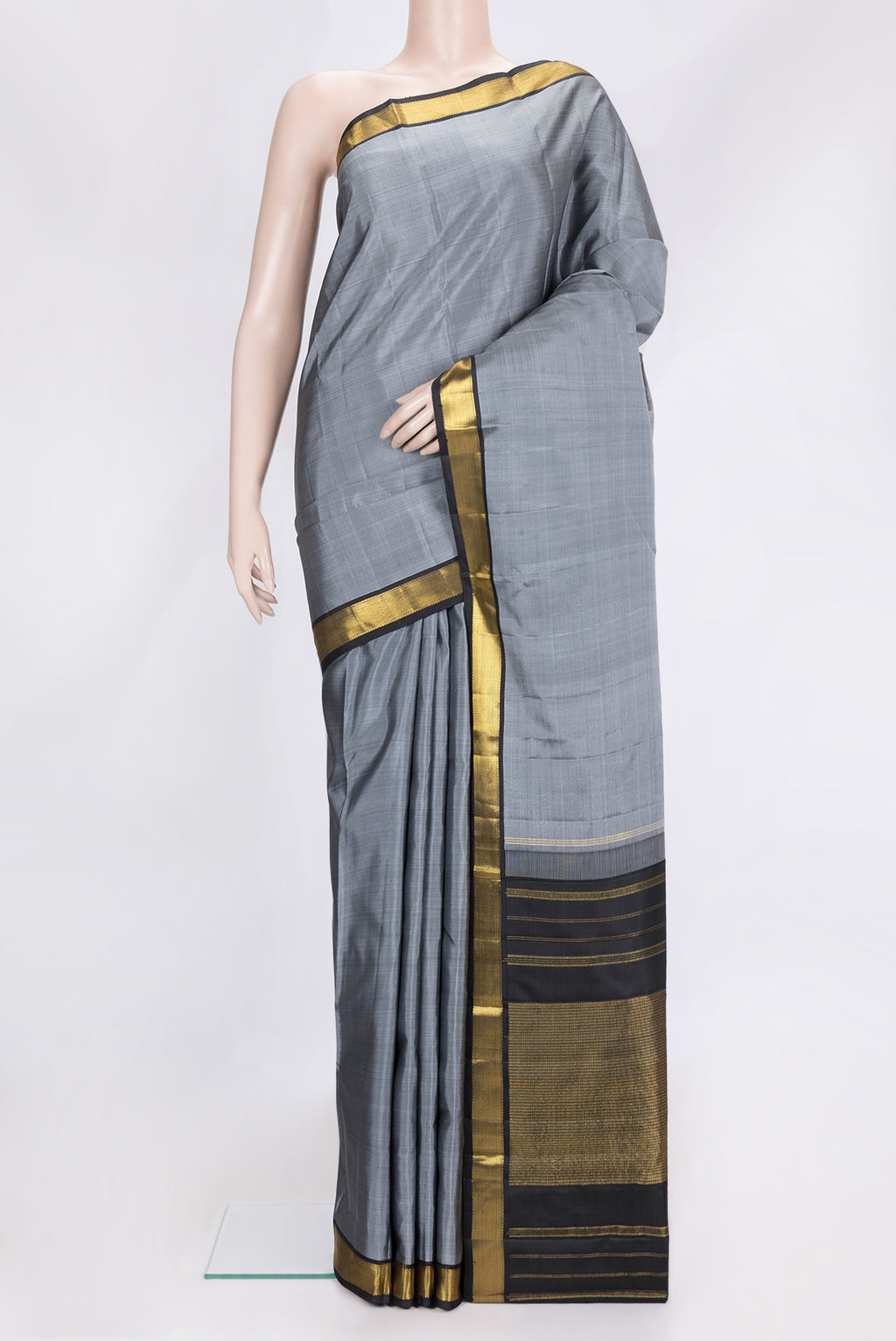 Grey Dual Tone Kanjivaram Silk Saree with Plain Body and Zari Border.  displayed on a mannequin