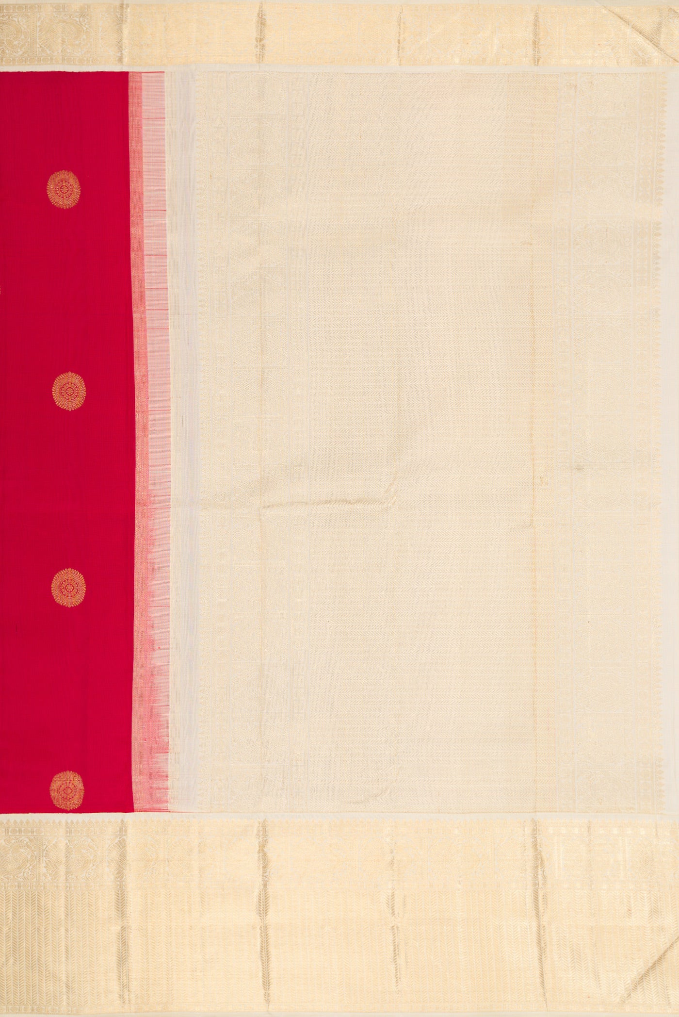 Close up image of the pallu of Maroon Dual Tone Kanjivaram Silk Saree with Zari Butta on the body and Zari Border. 