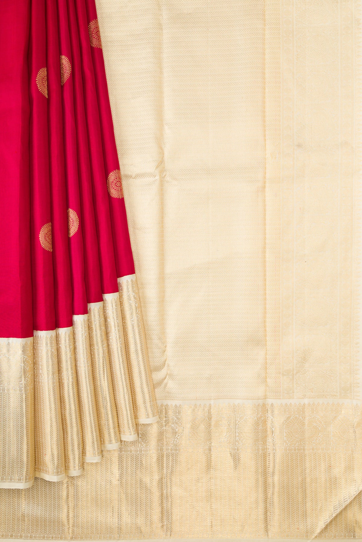 Pleats and pallu of Maroon Dual Tone Kanjivaram Silk Saree with Zari Butta on the body and Zari Border. 