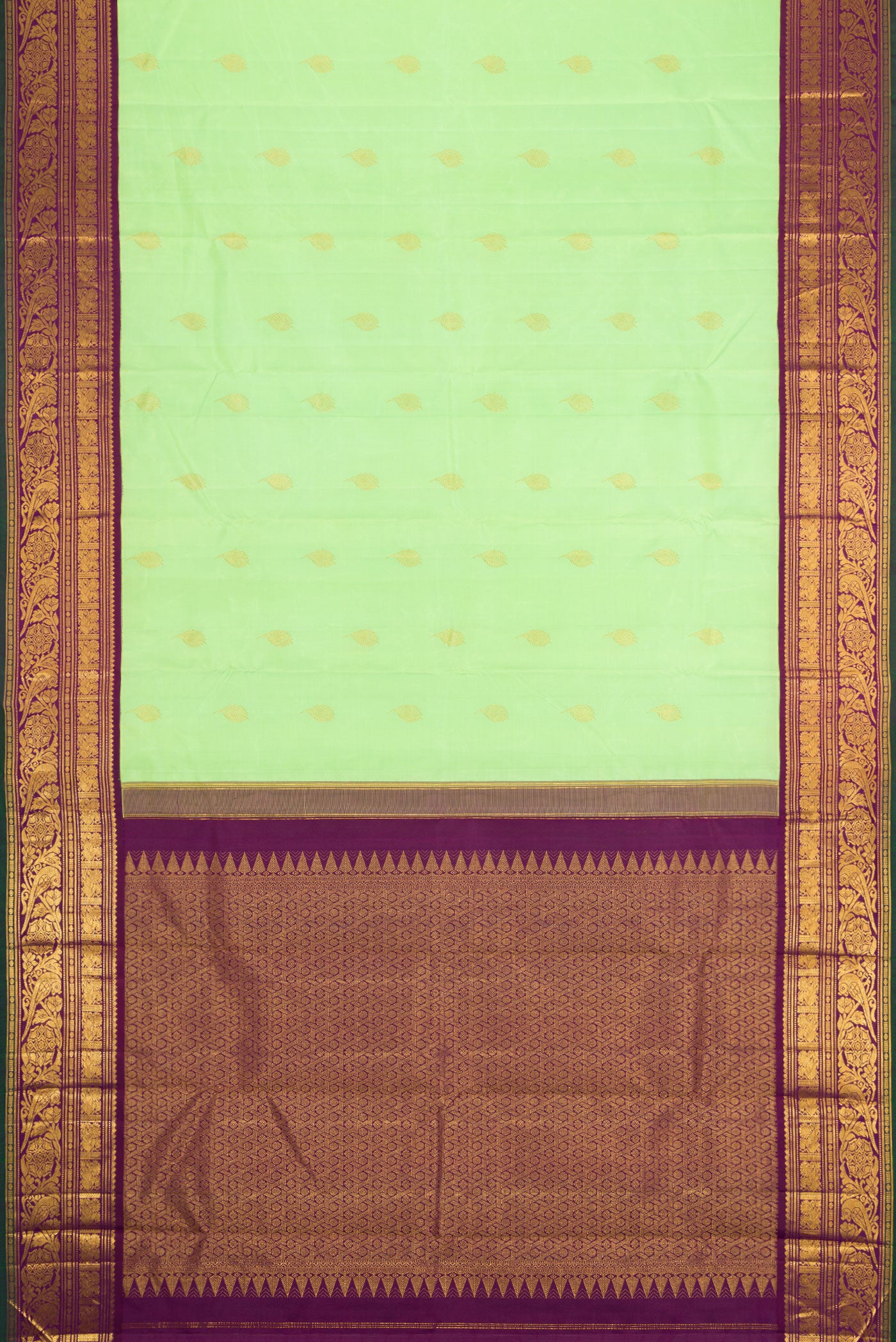 Flat view of Parrot Green Dual Tone Kanjivaram Silk Saree with Zari Butta on the body and Zari Border. 