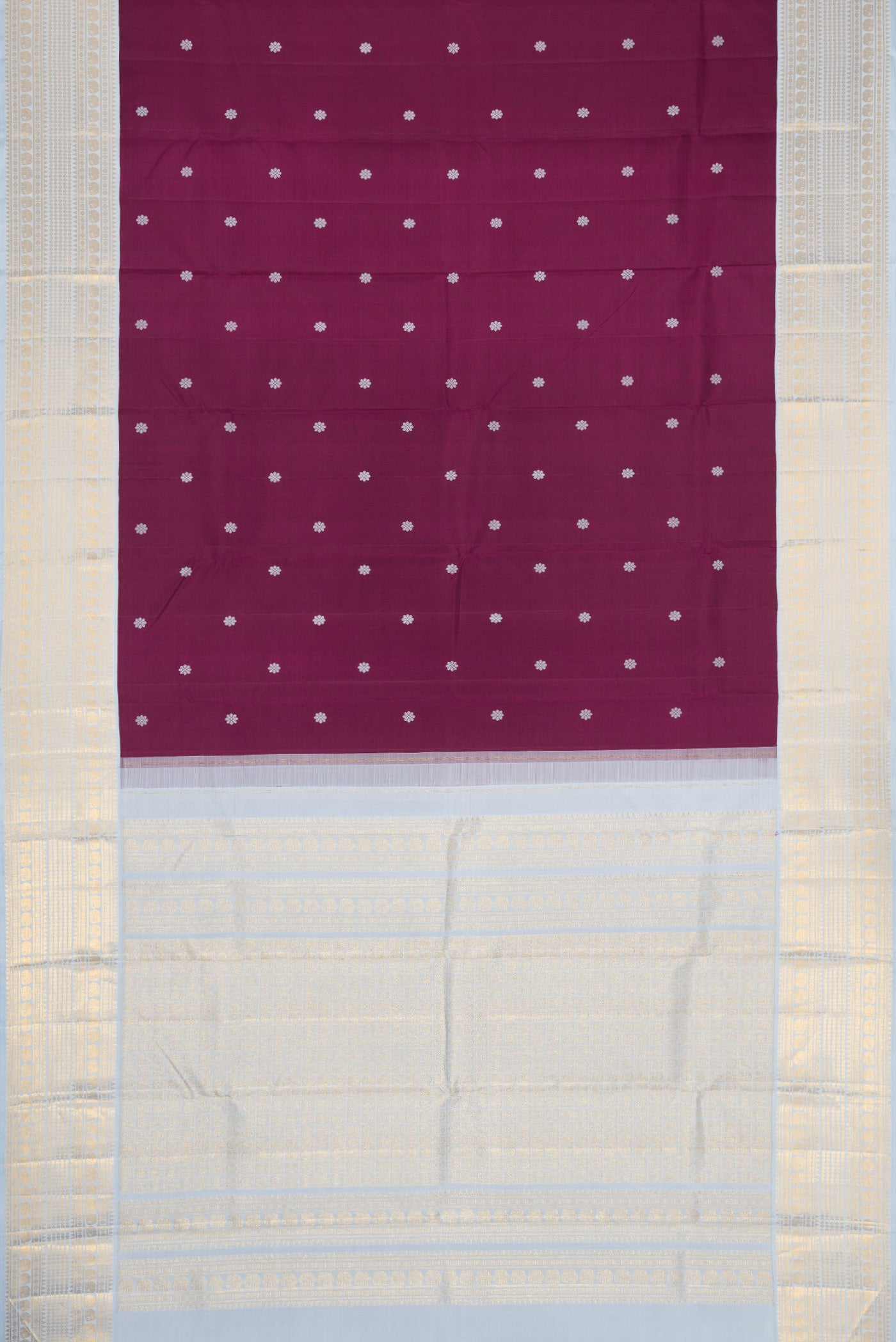 Flat view of Pure Silk Pure Zari Brown Dual Tone Kanjivaram Saree with Thread Butta on the body and Zari Border. 