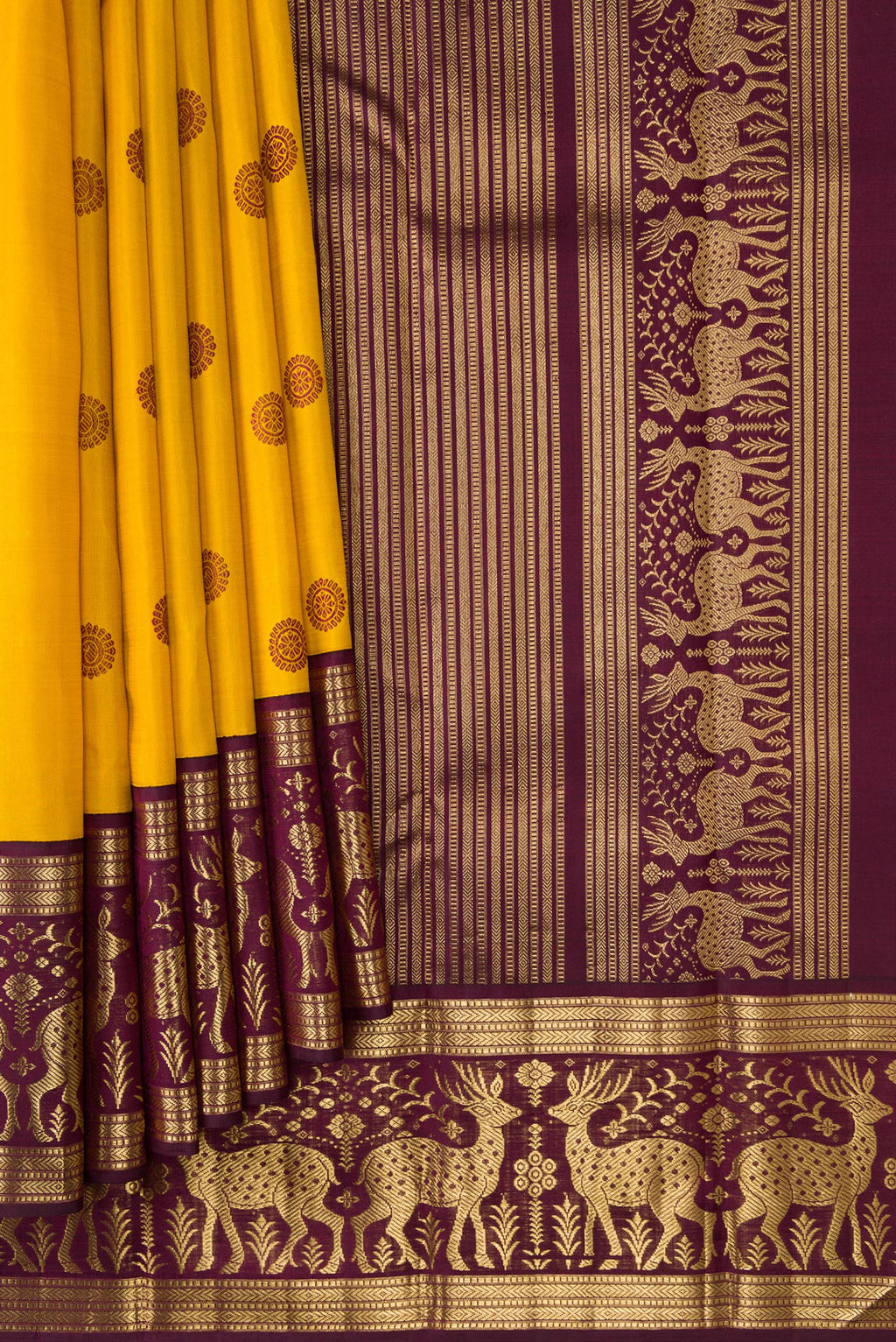 Pleats and pallu of Mustard Dual Tone Kanjivaram Silk Saree with Thread Butta on the body and Fancy Border. 