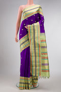 Violet Dual Tone Kanjivaram Silk Saree with Thread Butta on the body and Zari And Thread Border.  displayed on a mannequin