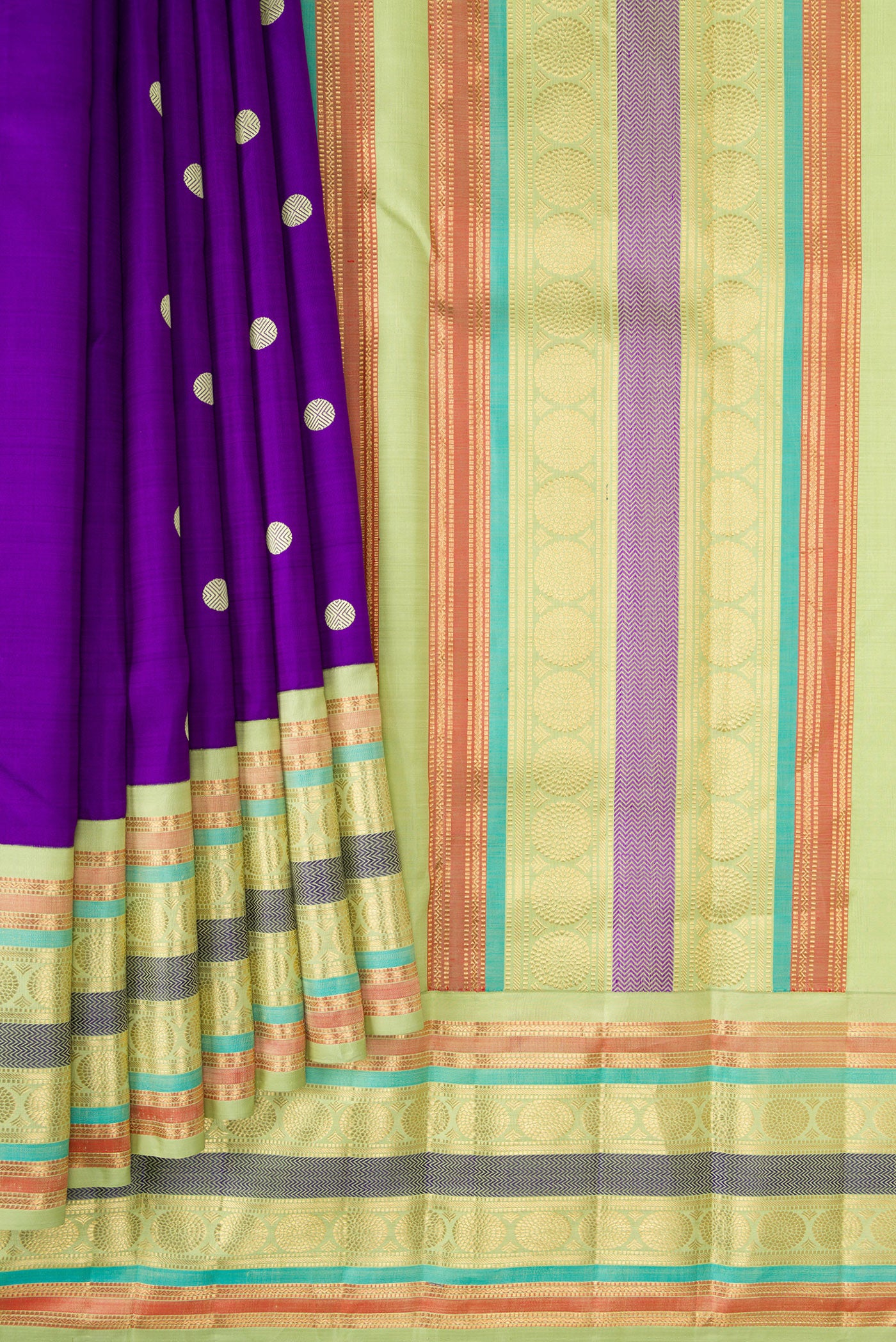 Pleats and pallu of Violet Dual Tone Kanjivaram Silk Saree with Thread Butta on the body and Zari And Thread Border. 