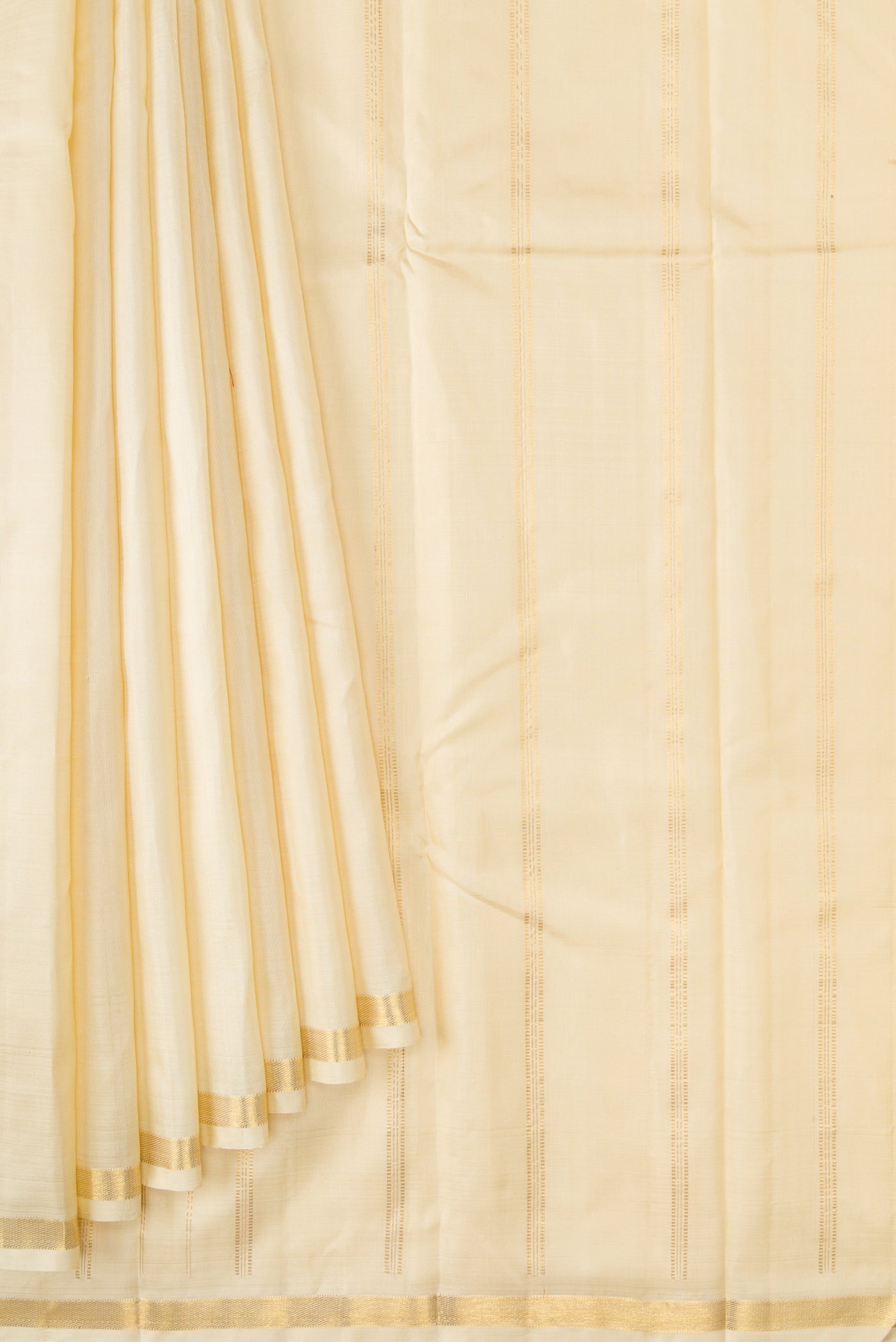 Pleats and pallu of Off White Dual Tone Kanjivaram Silk Saree with Plain Body and Zari Border. 