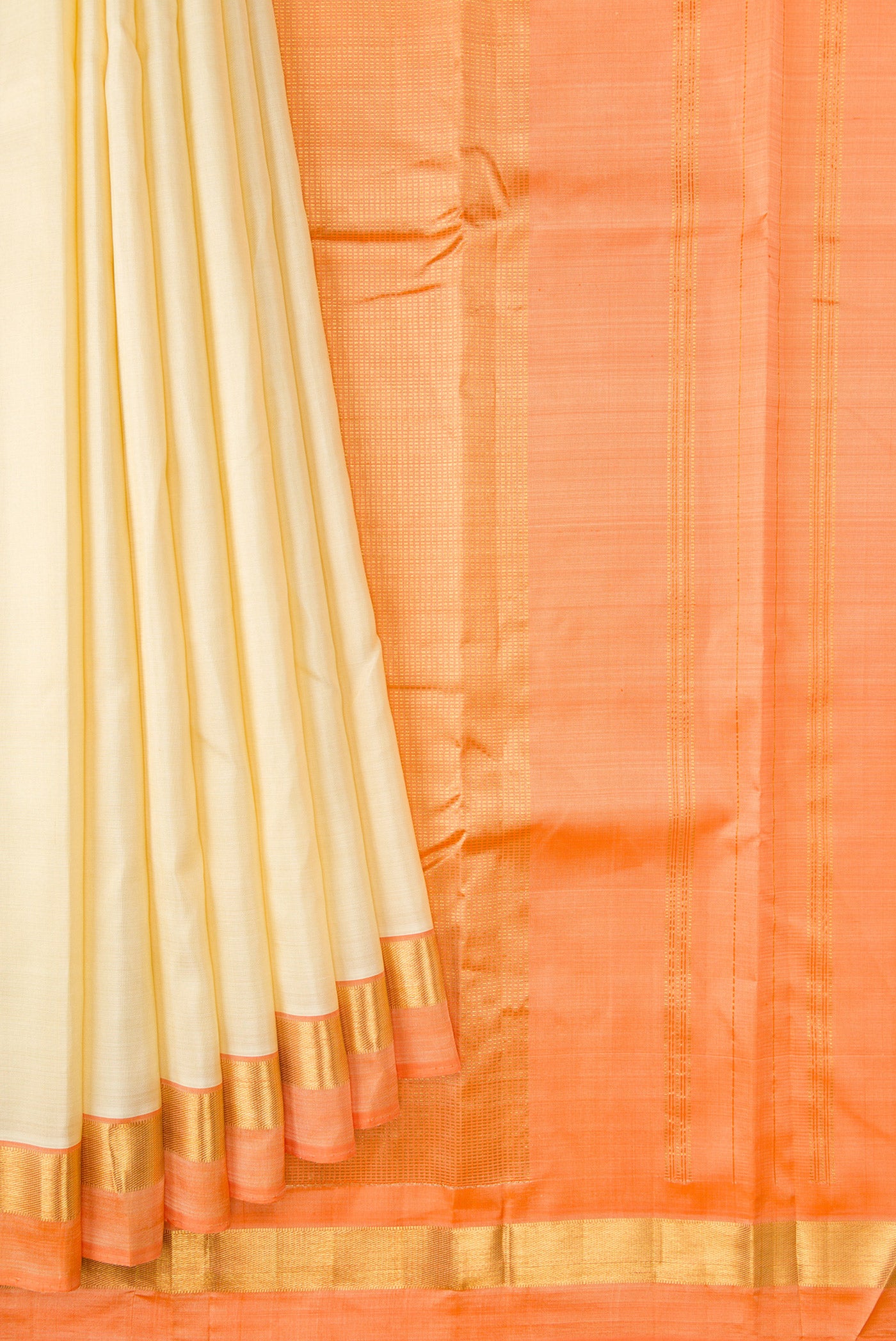 Pleats and pallu of Sandal Dual Tone Kanjivaram Silk Saree with Plain Body and Zari Border. 