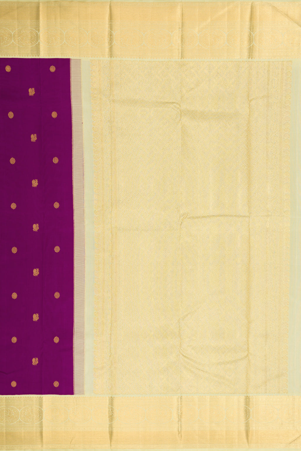 Close up image of the pallu of Purple Dual Tone Kanjivaram Silk Saree with Zari Butta on the body and Zari Border. 